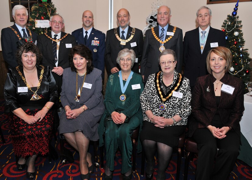 County councillors, area mayors and dozens of other distinguished visitors met with base leadership at RAF Mildenhall for an annual Yuletide reception held at The Galaxy Club Dec. 4. Front row (left to right) was Cllr. Shelagh Gurney, Norfolk County Council chairman; Cllr. Linda Oliver, Cambridgeshire County Council chairman; Roslyn Cresswell, East Cambs District Council mayoress; Cllr. Jane Bailey, Newmarket mayor; and Stacey Manske, RAF Mildenhall Officer Spouse’s Club member and wife of Col. Chad Manske, 100th Air Refueling Wing commander. Back row (left to right) was Cllr. Brian Sulman, Mildenhall Parish Council chairman; Cllr. Malcolm Smith, Forest Heath District Council chairman; Colonel Manske; Cllr. John Rogers, Breckland District Council chairman; Cllr. Peter Cresswell, East Cambs District Council chairman; and David Oliver, Cambridgeshire County Council consort. (U.S. Air Force photo/Tech. Sgt. Kevin Wallace)