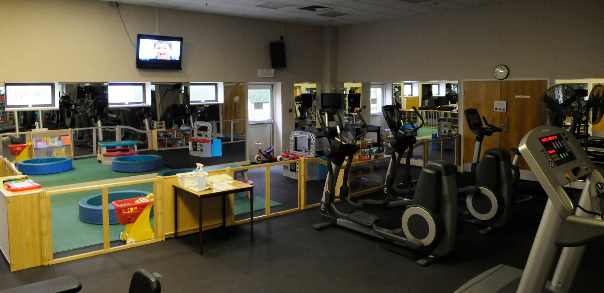 RAF MILDENHALL, England -- A new children’s area in the north-side gym offers parents a chance to exercise while their children play in an area filled with toys and children’s programs.  The children's area was built after a recommendation by the base population was approved through an Air Force Smart Operations for the 21st Century survey.  (U.S. Air Force photo/Staff Sgt. Christopher L. Ingersoll)