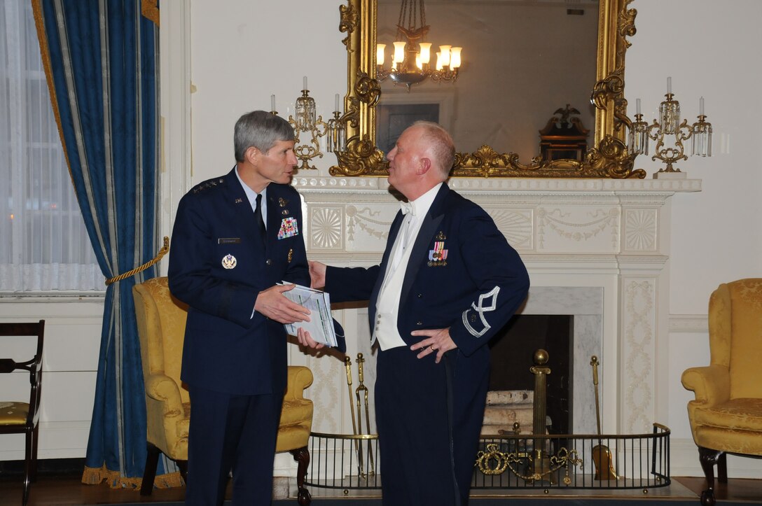 Lt. Col. Alan Sierichs, right, Air Force Band music director and commander, shares a laugh with Gen. Norton Schwartz, Air Force chief of staff at a reception following the Air Force Band's 2009 holiday concert. The Air Force Band performed “Hooray for the Holidays” at the Daughters of the American Revolution Hall, just two blocks West of the White House in Washington, D.C. on December 6.
Colonel Sierichs led the band and singing sergeants in their performance in front of the “Top Five” Air Force leaders in the National Capitol Region, including General Schwartz, Vice Chief of Staff, Gen. Harold Chandler, Assistant Vice Chief of Staff, Lt. Gen. William Shelton, AFDW Commander Maj. Gen. Darrell E. Jones and 11th Wing Commander Col. Cedric George. 
