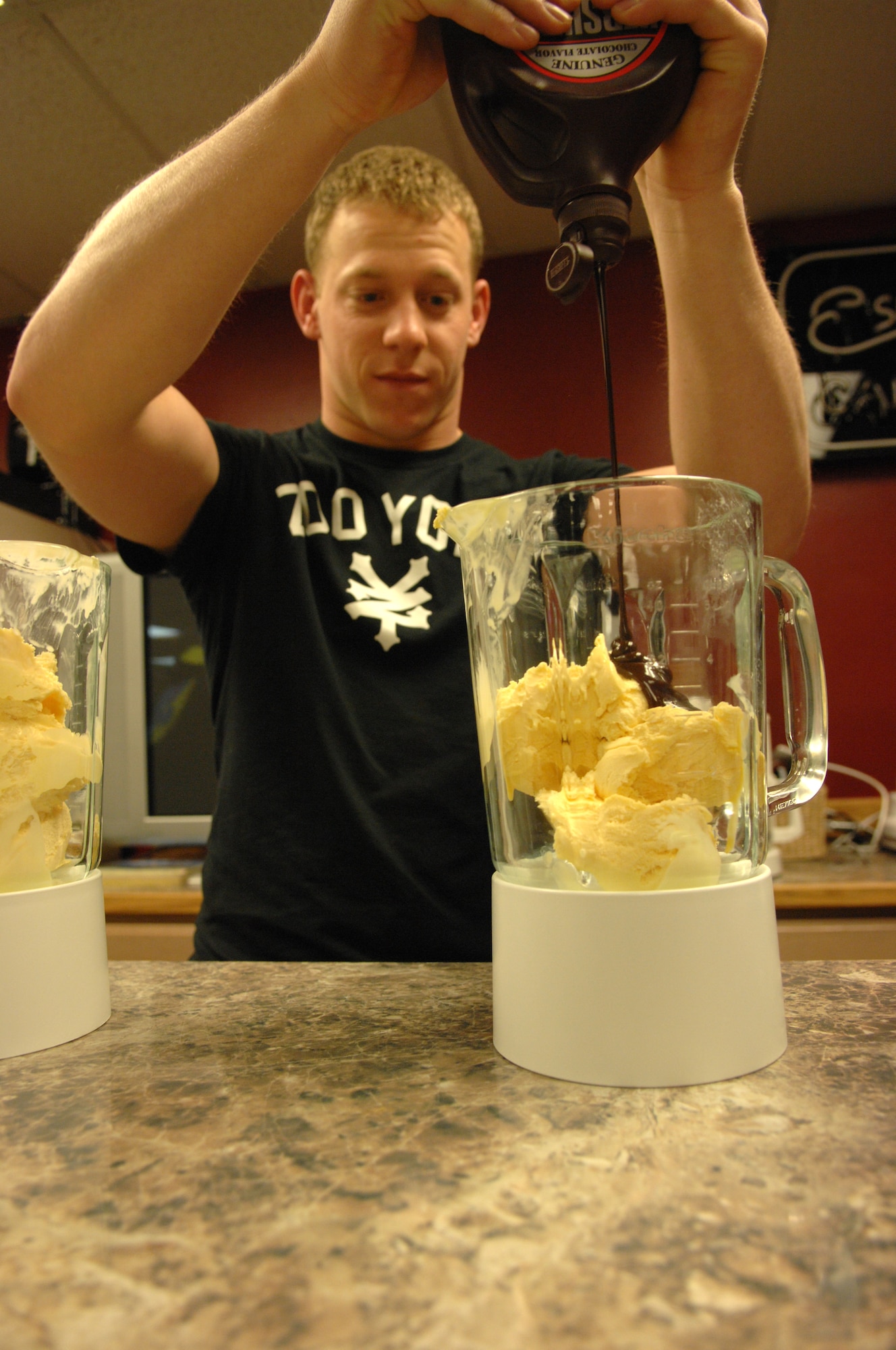 Airman Dustin Dezotell makes a milkshake at the North Star Airman's Cafe Dec. 8, 2009, Eielson Air Force Base, Alaska. The North Star Cafe is open to Airman E-4 and below and serves as a relaxing, fun and entertaining place where Airmen can go to hang out with friends, relieve stress or just get a good latte or milkshake free of charge. Airman Dezotell is assigned to the 354th Civil Engineering Squadron. (U.S. Air Force photo/Airman 1st Class Rachelle Coleman)