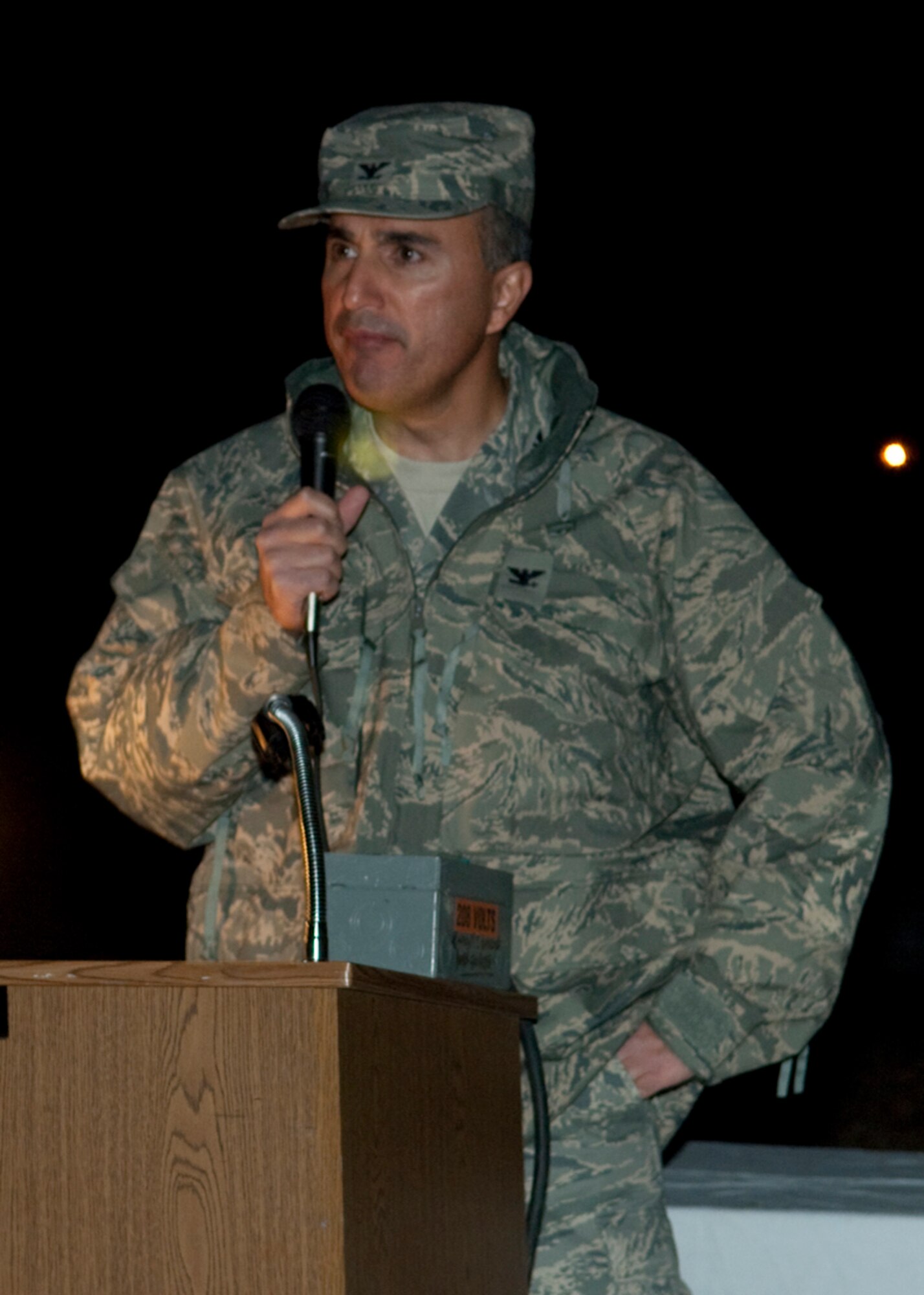 Col. Joe Torres, 95th Air Base Wing vice commander, talks to Edwards community during the 13th Annual Holiday Tree Lighting ceremony Dec. 2 at the Base Exchange parking lot. The festivity also featured Santa Claus and machine-generated snow. (U.S. Air Force photo/Michael Yncera)