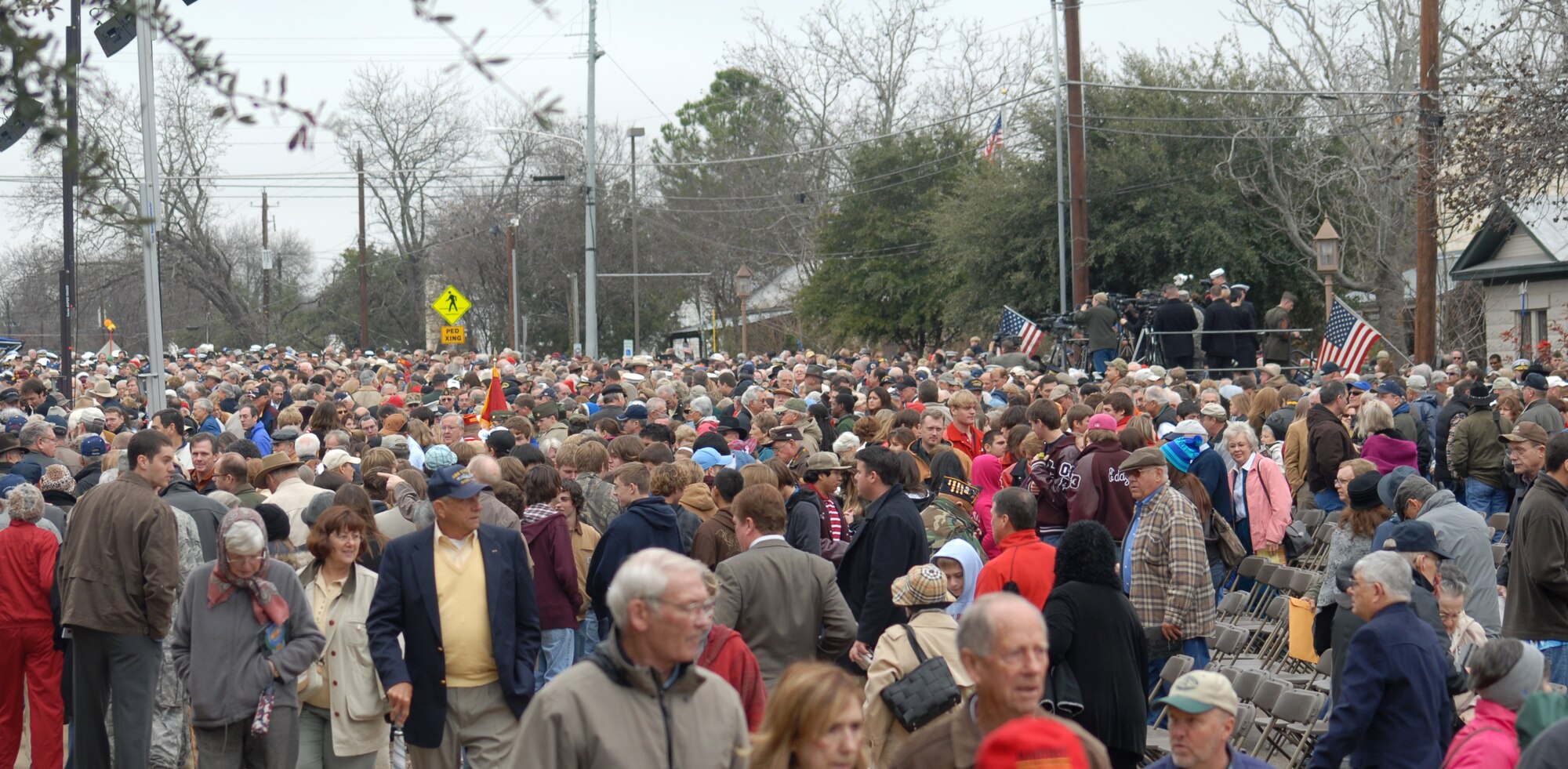 Over 4,000 people attend the grand opening ceremony of the George H.W. Bush Gallery of the War in the Pacific Museum, Fredericksburg, Texas on Dec. 7.  80 volunteers of Soldiers, Sailors, Airman and Marines from Goodfellow travelled 150 miles to help with the opening of the museum expansion, providing chair set-up and tear down, distinguished guests escort and led tours of the new facility.  The former President George H.W. Bush, attended as well as Rick Perry, Governor of Texas.  Over 4,000 people were in attendance.  (U.S. Air Force photo by/Robert D. Martinez)