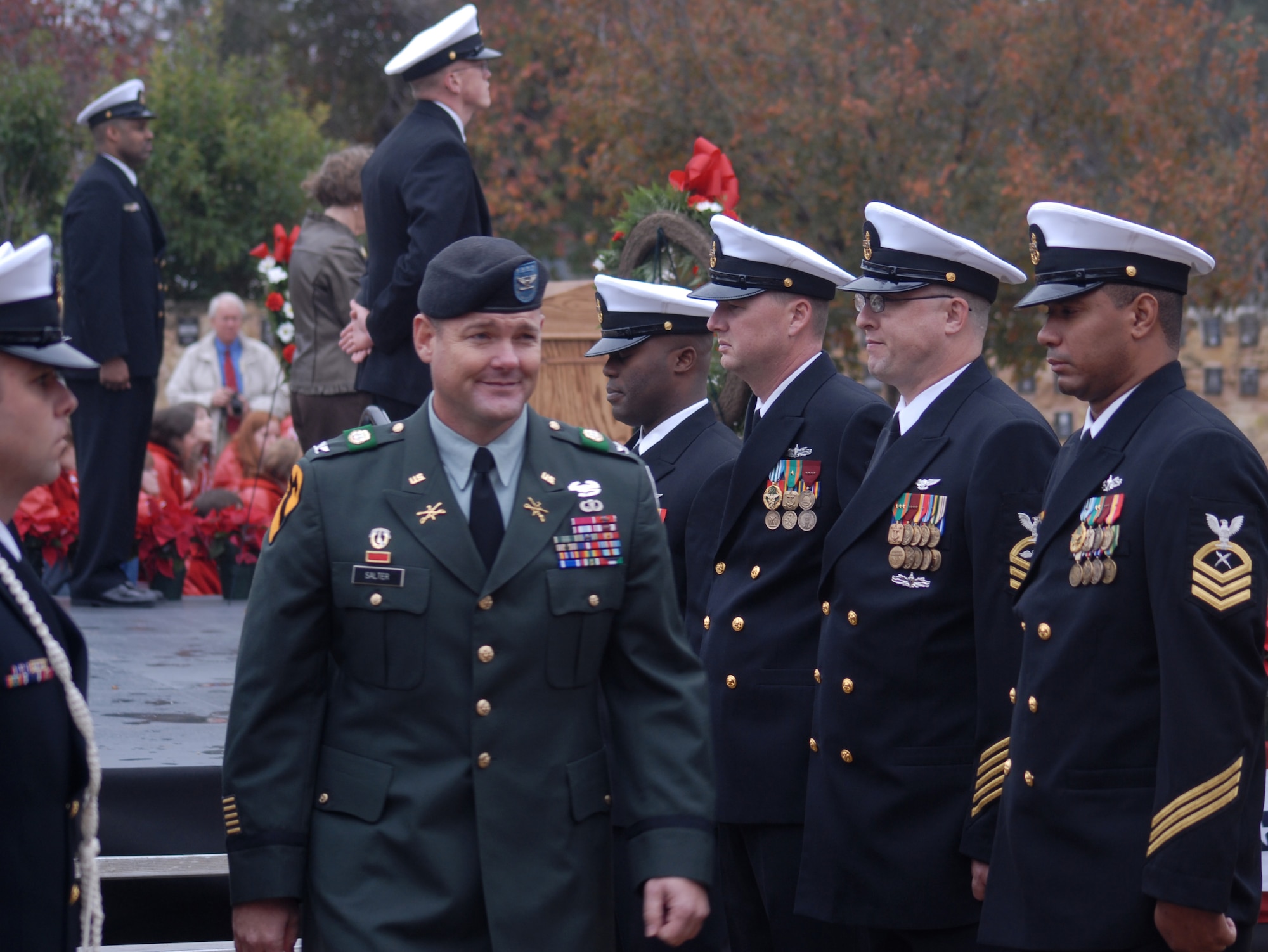 Navy Chief Petty Officers from Goodfellow AFB, Texas, serve as side boys, or Navy honor guard, along with other CPOs from San Antonio, for the Pearl Harbor Day remembrance ceremony in Fredericksburg on Dec. 7.  Earlier in the day, the grand opening ceremony of the George H.W. Bush Gallery of the War in the Pacific Museum was held.  80 volunteers of Soldiers, Sailors, Airman and Marines from Goodfellow travelled 150 miles to help with the opening of the museum expansion, providing chair set-up and tear down, distinguished guests escort and led tours of the new facility.  The former President George H.W. Bush, attended as well as Rick Perry, Governor of Texas.  Over 4,000 people were in attendance.  (U.S. Air Force photo by/Robert D. Martinez)