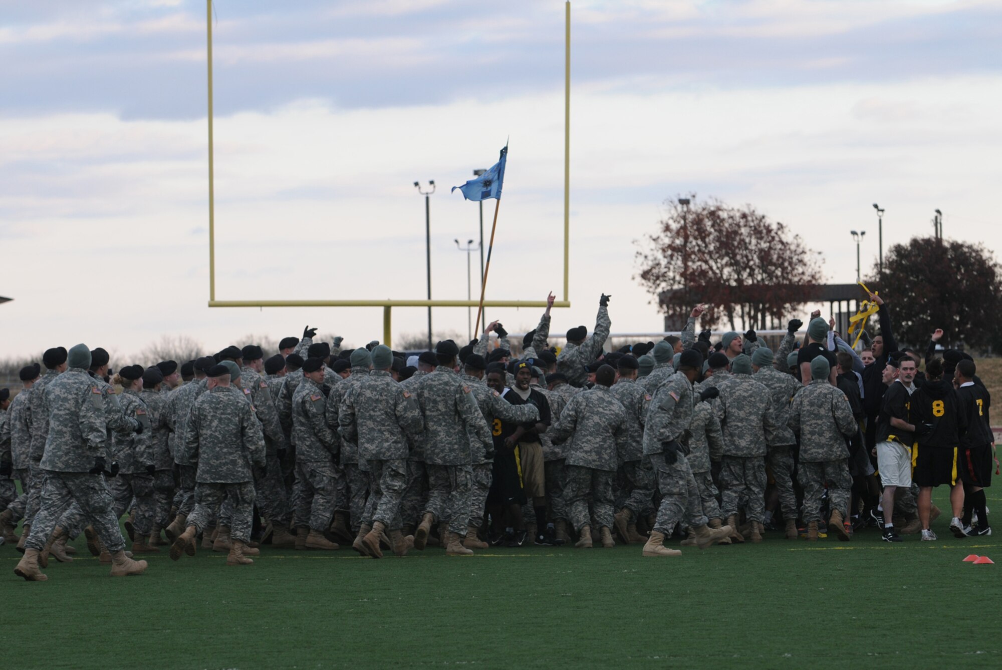 GOODFELLOW AIR FORCE BASE, Texas -- The 344th Military Intelligence Battalion crowds the field in celebration after the Army won the Army-Navy Football Game, Dec. 4, 2009. The final score was 20-8. (U.S. Air Force photo/Airman Clayton Lenhardt)