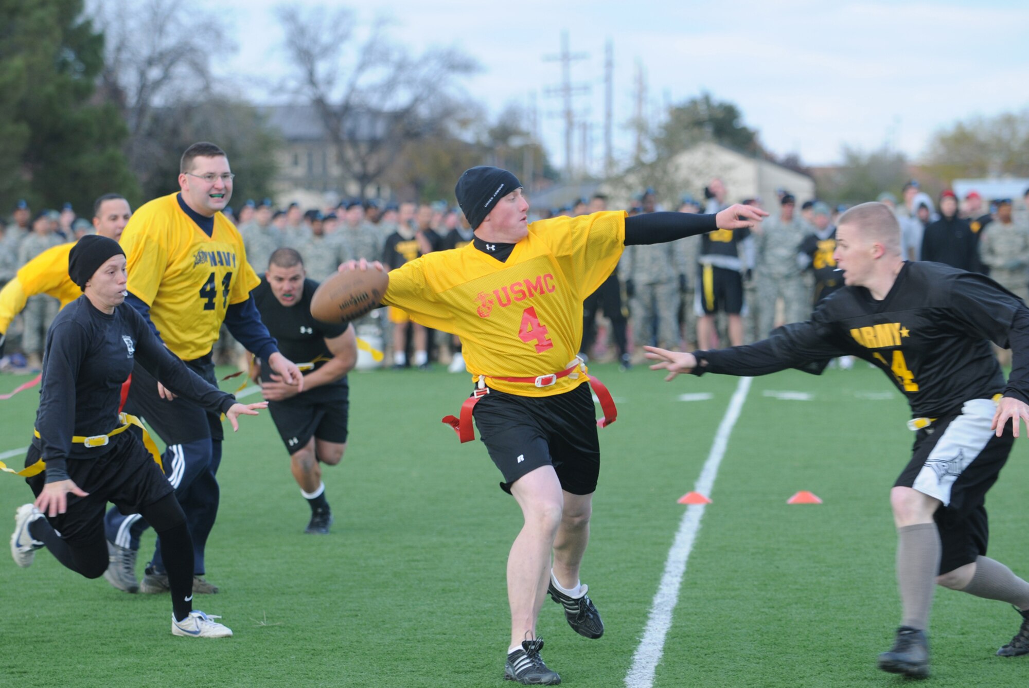GOODFELLOW AIR FORCE BASE, Texas -- A Marine player is rushed as he attempts to make a pass during the Army-Navy Football Game, Dec. 4, 2009. Army took the win, 20-8. (U.S. Air Force photo/Airman Clayton Lenhardt)