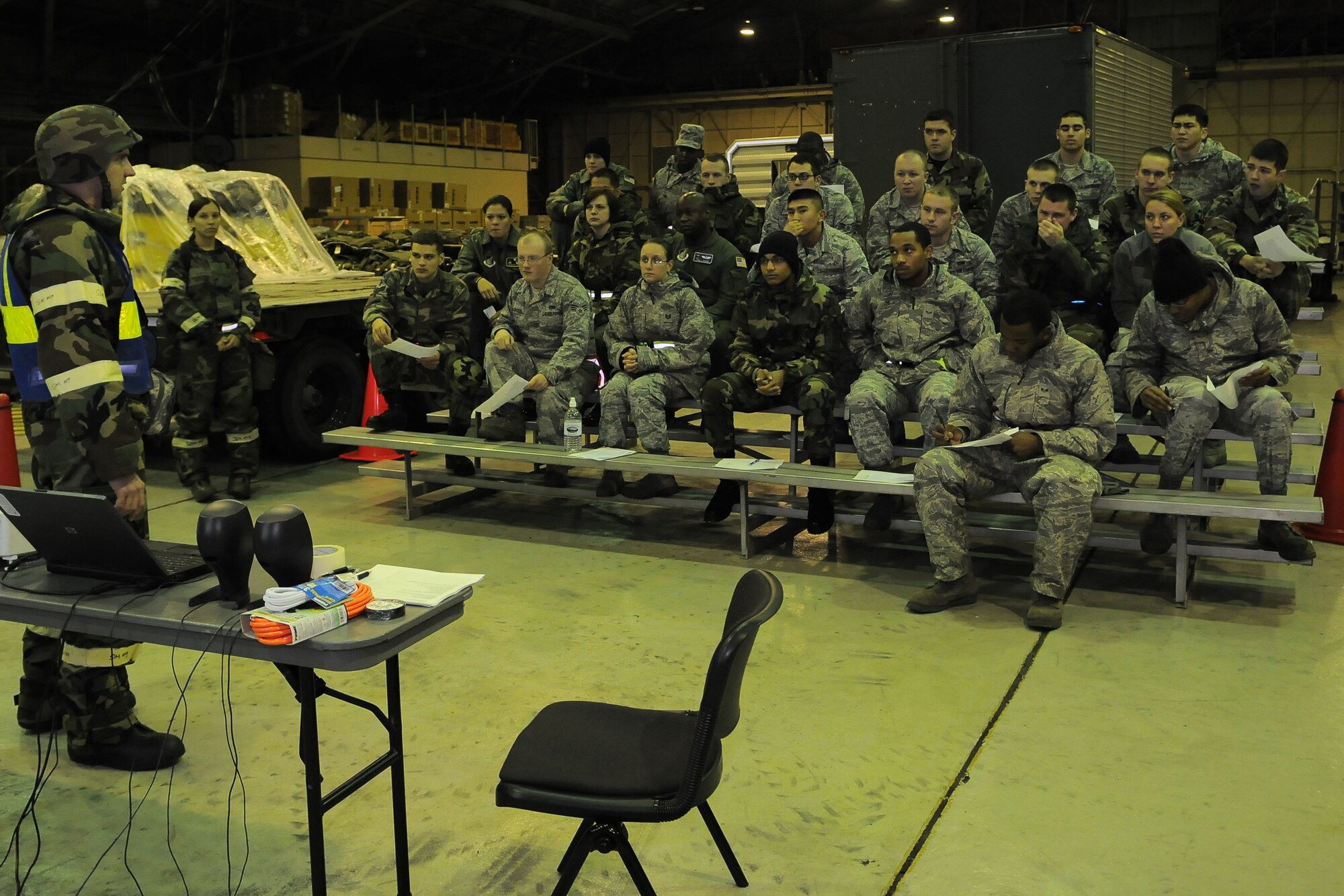 YOKOTA AIR BASE, Japan -- Capt. Michael Weeks, 374th Force Support Squadron, briefs simulated incoming forces upon their arrival during an operational readiness inspection conducted by the Pacific Air Forces Inspector General. The reception of forces is one of the primary missions of the base during various contingency operations. (U.S. Air Force photo/Airman 1st Class Michael Dillon) 