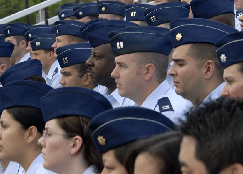 Airmen listen to guest speaker James Aiona, Lt. Governor of Hawaii, during a remembrance ceremony commemorating the Dec. 7,1941 attacks on Hickam Air Field, now known as Hickam Air Base, Hawaii. The ceremony marked the 68th anniversary of the Japanese attack on Pearl Harbor and Hickam Air Field, and paid tribute the Airmen who were attacked and died on that tragic day. (U.S. Air Force photo/Tech. Sgt. Jerome S. Tayborn)