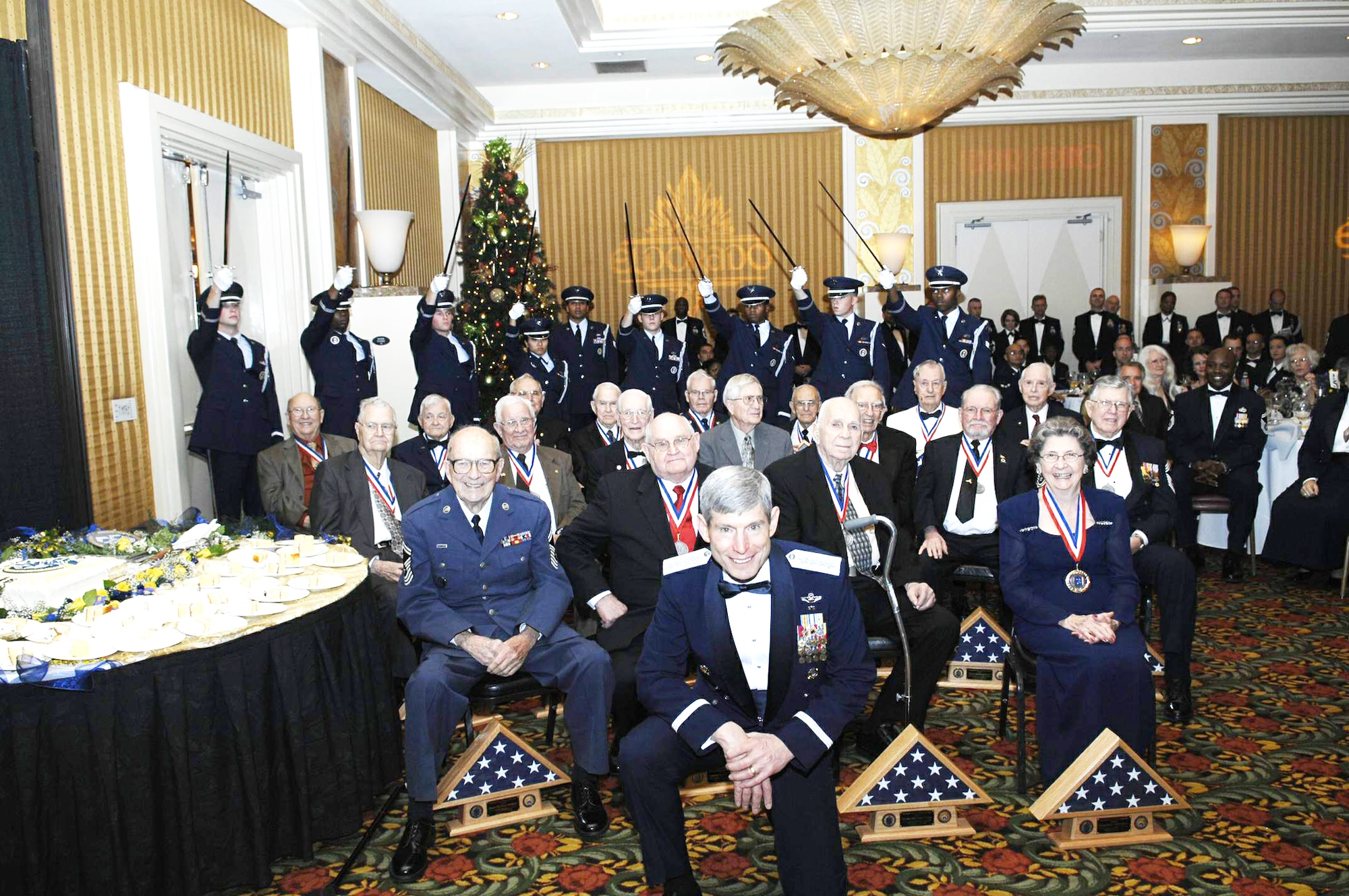 Air Force Chief of Staff Gen. Norton Schwartz joins 18 Charter Chiefs, the first Airmen promoted to the rank of chief master sergeant in the Air Force Dec. 1, 2009, at Barksdale Air Force Base, La. Dec. 1 marked the 50th anniversary of the first 625 Airmen to be promoted to the rank of chief master sergeant. (U.S. Air Force photo/Senior Airman Ryan Ivacic)
