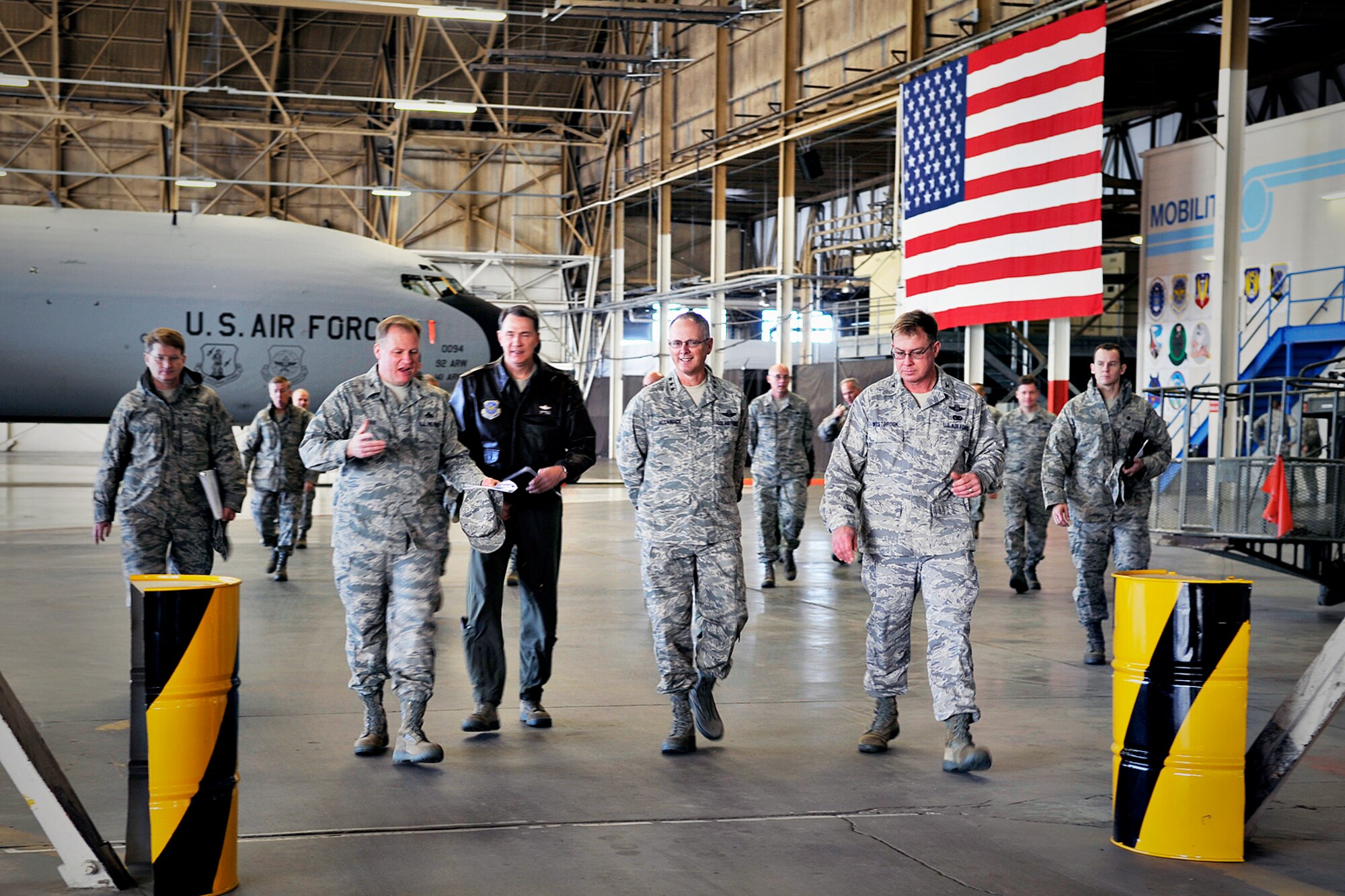 Gen. Robert R. Allardice, 18th Air Force commander, walks with Fairchild
leadership here Nov. 21. The general made a handful of stops to agencies
throughout the base to familiarize himself better with local base practices
and meet with leadership from the 141st and 92nd Air Refueling Wings. (U.S. Air Force photo/Senior Airman Joshua Chapman)