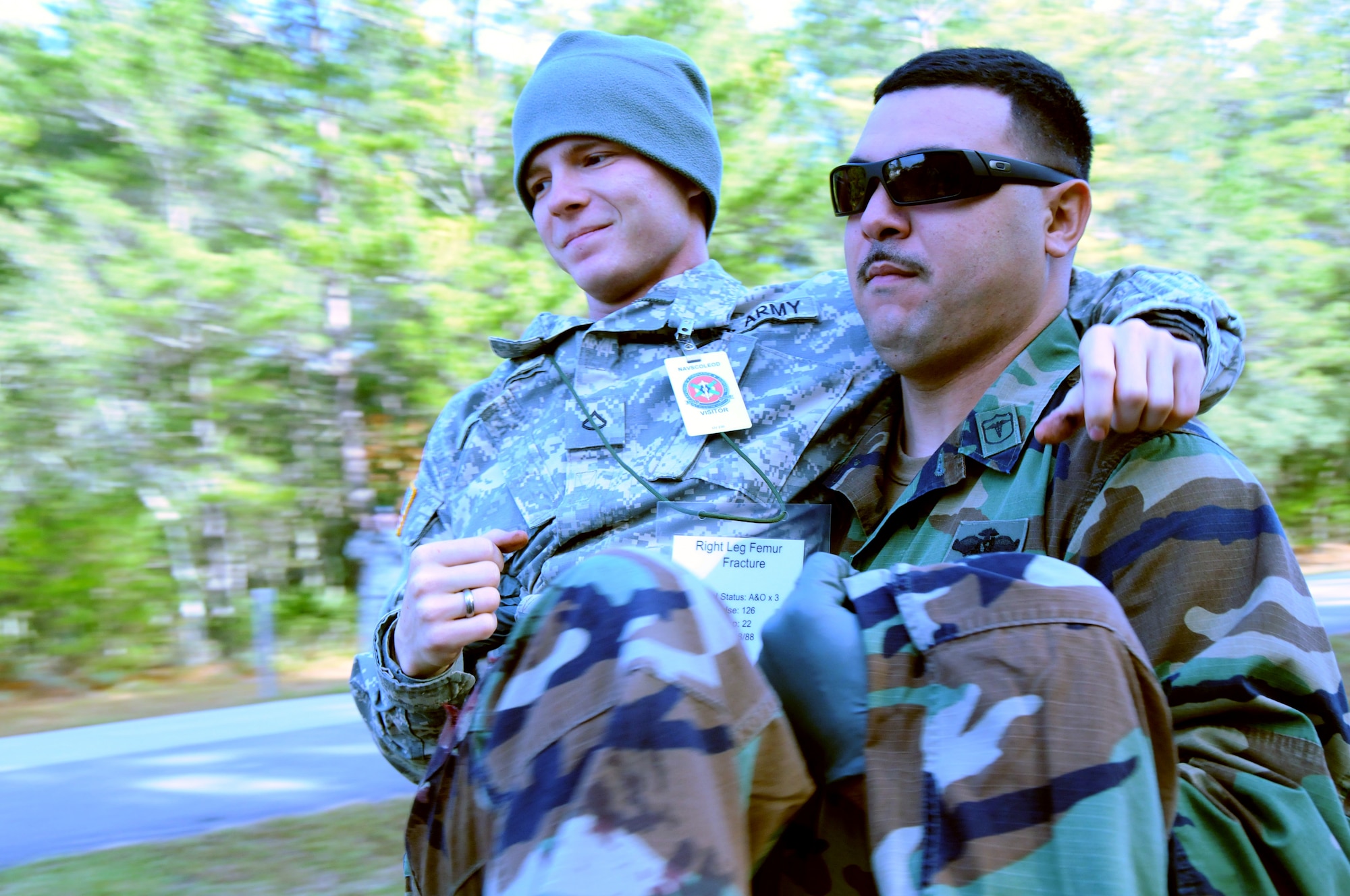 EGLIN AIR FORCE BASE, Fla. – A Navy first responder carries an “injured victim” to safety during a major accident response exercise, Dec. 7, at the Naval Explosive Ordnance Disposal School. The event simulated an accident where a truck carrying C-4 explosives careens into a bus filled with Soldiers. The NAVEOD School performs MAREs annually to examine how effective they can respond in the event of a catastrophe while communicating and working with outside emergency agencies. (U.S. Air Force photo/ Airman 1st Class Anthony Jennings)