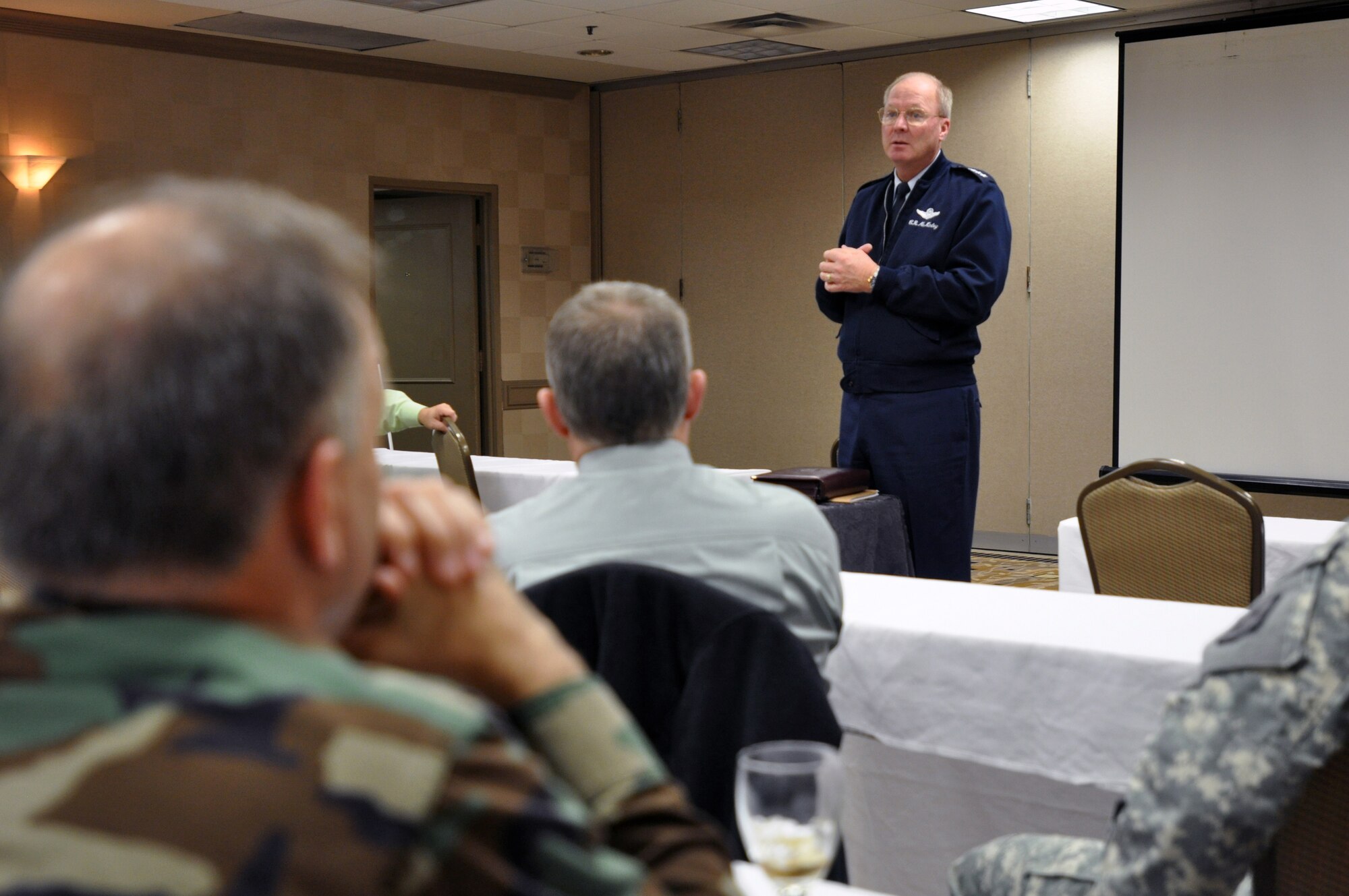 Gen. Craig McKinley, chief, National Guard Bureau, addresses the recent graduates of the NGB Continuous Process Initiative black belt course in Arlington, Va., Dec. 4, 2009. During the course, students learn how to use statistical analysis and other tools as ways to improve upon the efficiency of processes and programs within their unit. Those programs can range anywhere from streamlining the deployment process to improving on vehicle maintenance schedules. 