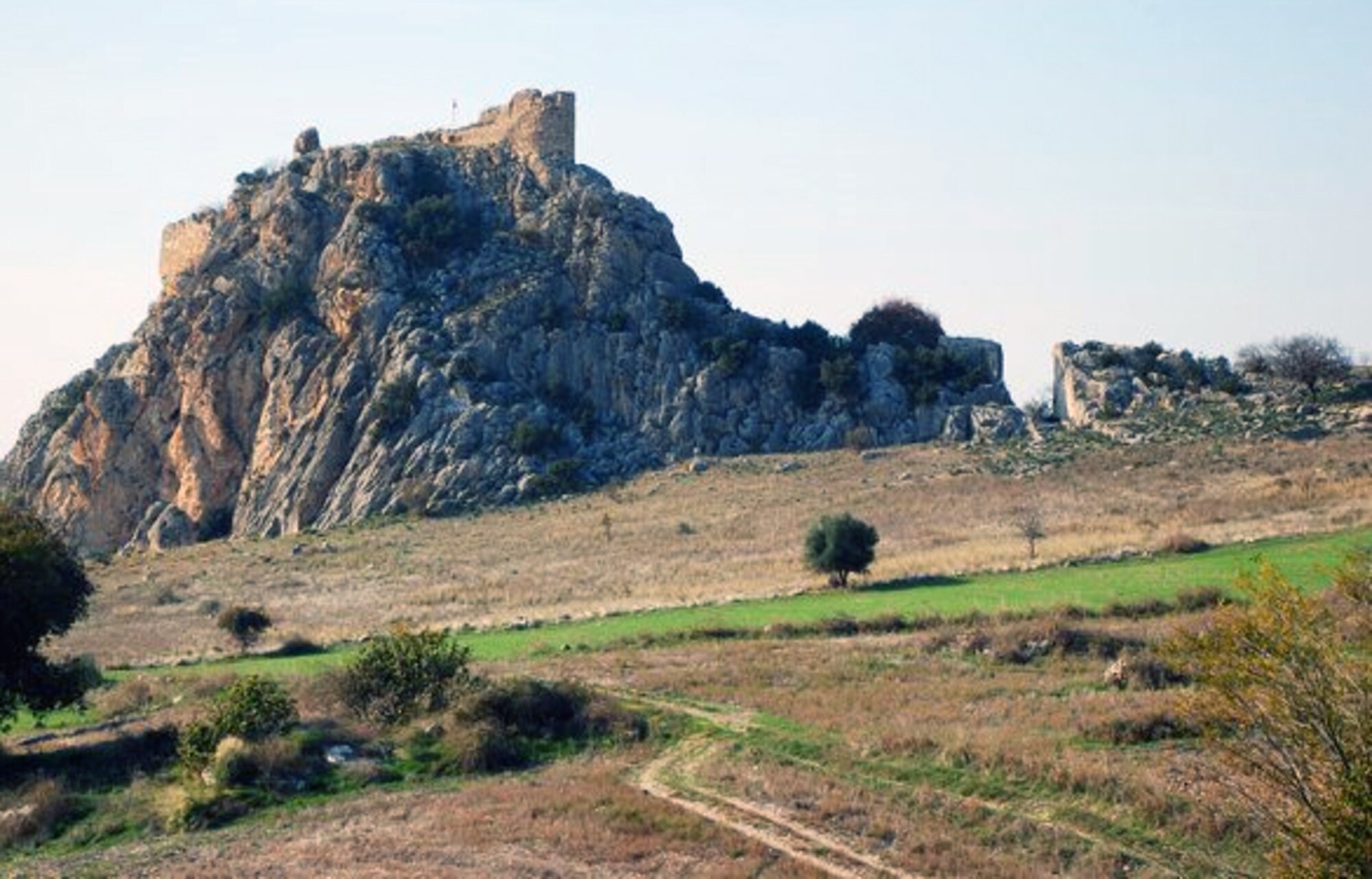 The back side of the castle and stone-walled gate is visible Saturday, Nov. 28, 2009, from the back side of the Hieropolis Castabala site. Hieropolis is known for Darius of Persia passing through in 333 B.C., its real permanence in history was 300 years later when it was the capital of an independent kingdom under Tarcondimotus. Tarcondimotus sided with Pompeii against Caesar and was killed in 31B.C. at the battle of Actium where the fleet of Marc Antony and Cleopatra was defeated. (U.S. Air Force photo/Senior Airman Sara Csurilla)