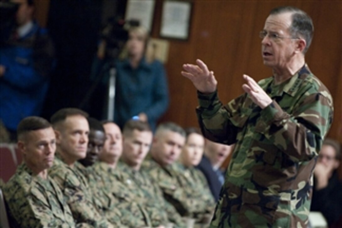 Chairman of the Joint Chiefs of Staff Adm. Mike Mullen, U.S. Navy, speaks to Marines at Camp Lejeune, N.C., on Dec. 7, 2009. The Marines are scheduled to be among the first units deployed under President Barack Obama's plan to surge 30,000 additional forces in Afghanistan.  Along with speaking to the Marines, Mullen also traveled to Fort Campbell, Ky., to visit soldiers that will also be deployed.  