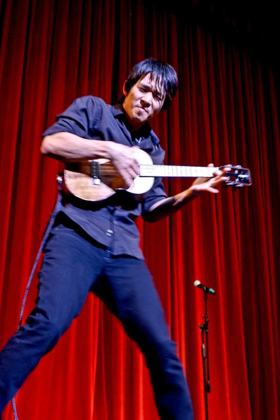 Ukulele player Jake Shimabukuro performs one of his songs during the Second Annual Na Mele o na Keiki, 'Music for the Children' concert Dec. 9 at the Neal S. Blaisdell Center. (Official U.S. Marine Corps photo by Sgt. Scott Whittington) (Released)