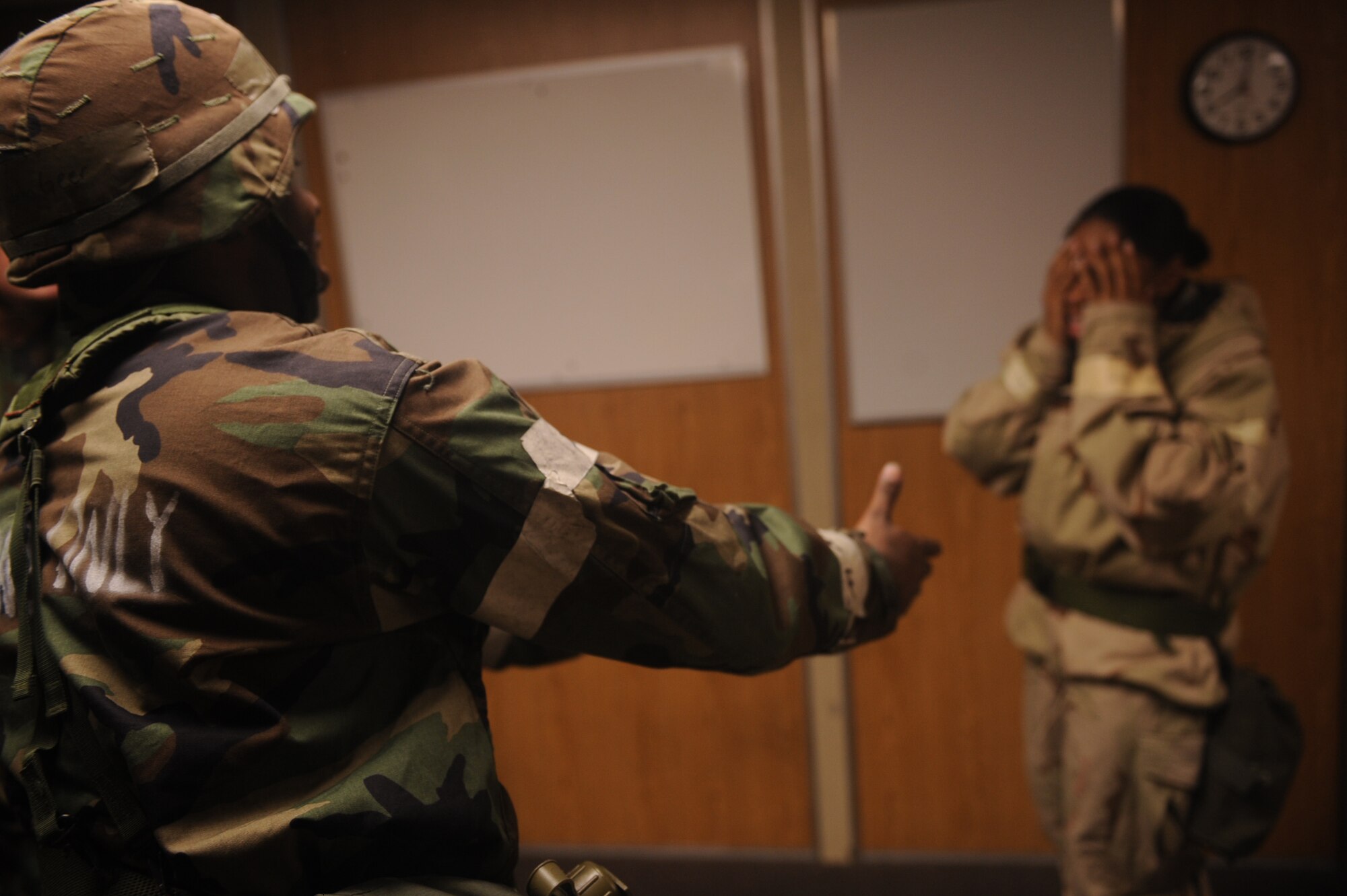 Staff Sgt. John Geer, 4th Fighter Wing chaplain assistant, calms Airman 1st Class Marissa Tucker, 4th FW Public Affairs journeyman, during an operational readiness exercise input on Seymour Johnson Air Force Base, N.C., Dec. 9, 2009. Chapel services are offered to help Airmen cope with stressful situations. (U.S. Air Force photo/Senior Airman Ciara Wymbs) 