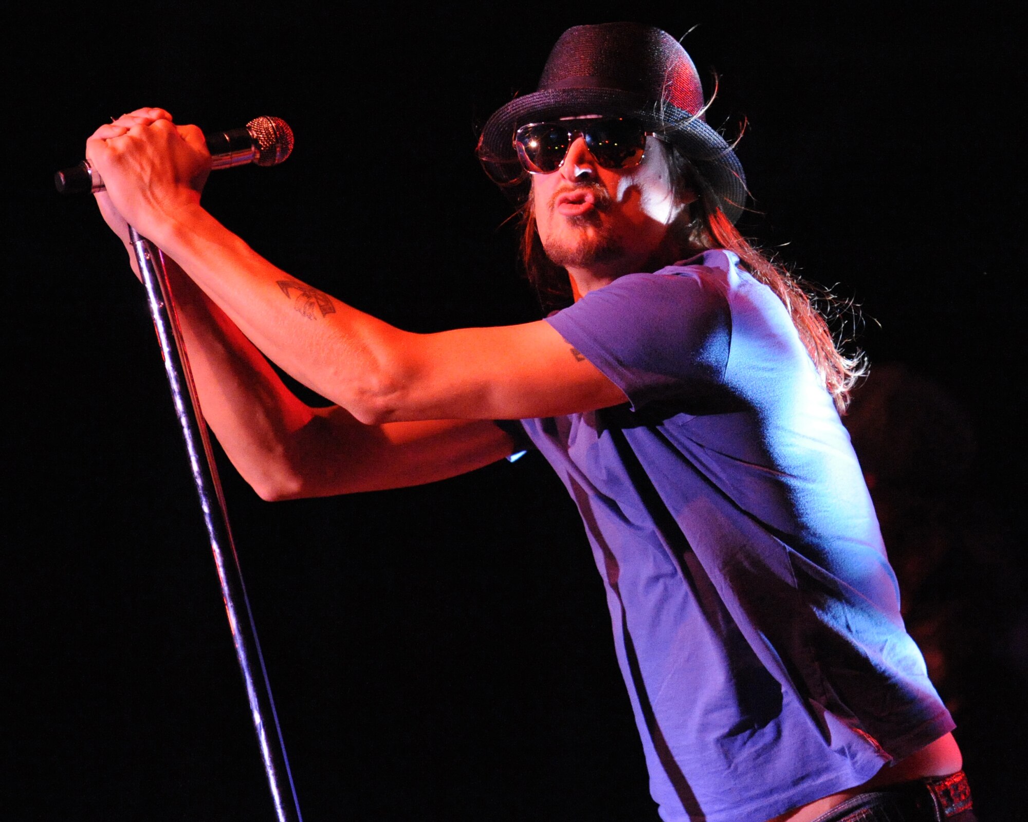 Kid Rock and the Twisted Brown Trucker Band brought their unique blend of Southern rock, soul, country, heavy metal and hip hop to Hanger 1, Ramstein Air Base Germany, Dec. 9, 2009.  Kid Rock and his band will entertain American troops in Southwest Asia and families in Europe Nov. 30 to Dec. 12 as a part of the ?Tour for the Troops 2009?.  (U.S. Air Force photo by: TSgt Sean Mateo White)