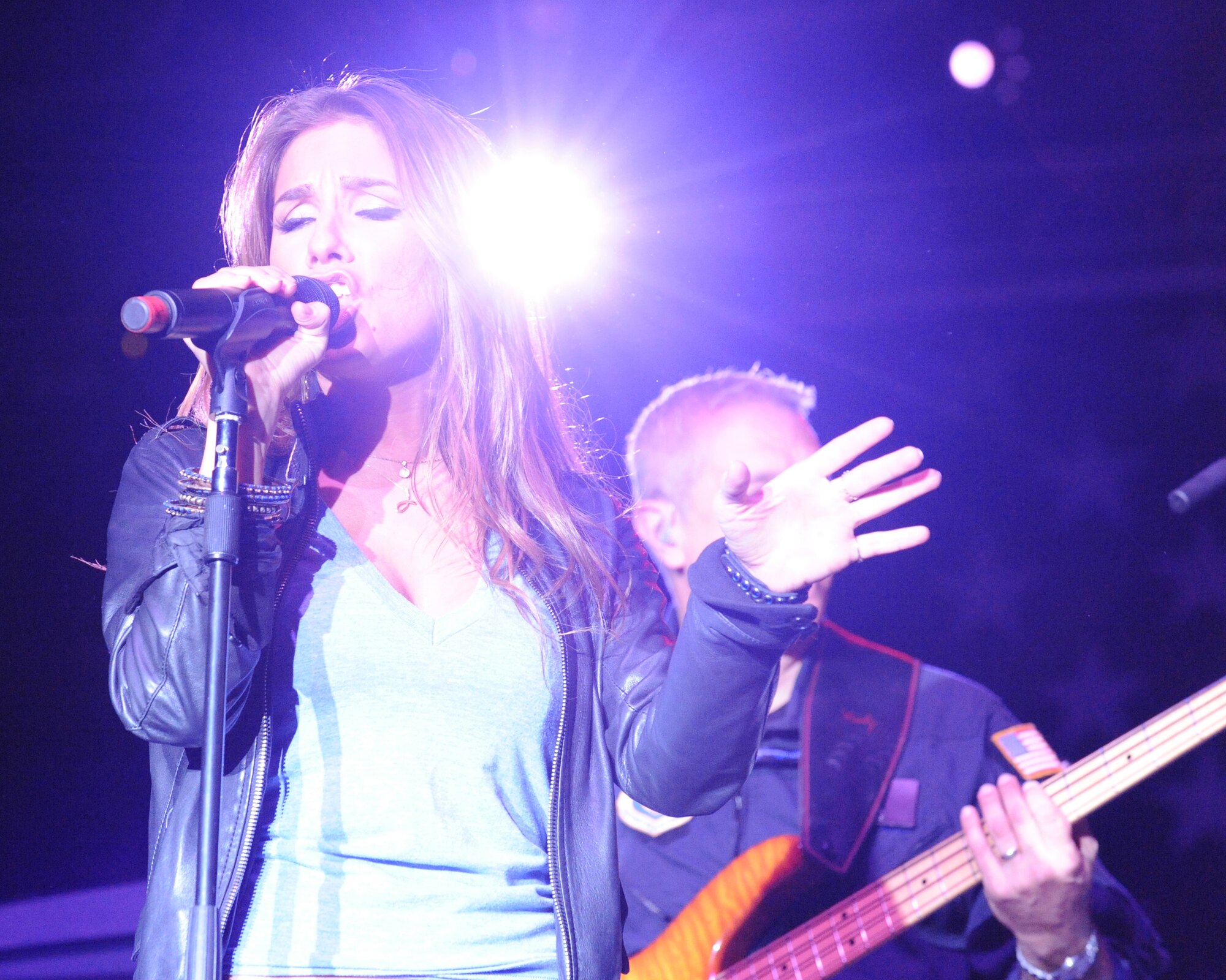 Jessie James, the daughter of an Air Force fighter pilot and a self-described military brat, performs for members of the Kaiserslautern Military Community, Ramstein Air Base Germany on Dec. 9, 2009.  Ms. James, who is quickly making a name for herself on both the pop and country music scenes will entertain troops in Southwest Asia and military families in Europe Nov. 30 to Dec. 12, along with fellow recording artist Kid Rock and comedian Carlos Mencia as a part of the ?Tour for the Troops 2009?.  (U.S. Air Force photo by: TSgt Sean Mateo White)