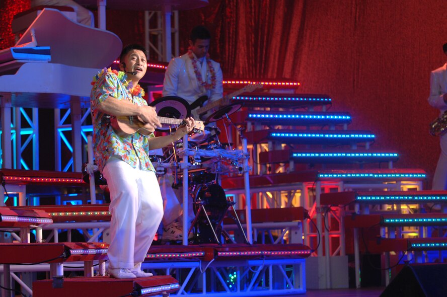 MINOT, N.D. -- Master Sgt. Herbert Ancog of Air Force Tops in Blue, sings during a performance at the Minot Municipal Auditorium here Dec. 8. Tops in Blue is an expeditionary entertainment unit providing quality entertainment for the Air Force Family on their 2009 world tour “To Dream”. (U.S. Air Force photo by Airmen 1st Class Aaron-Forrest Wainwright)