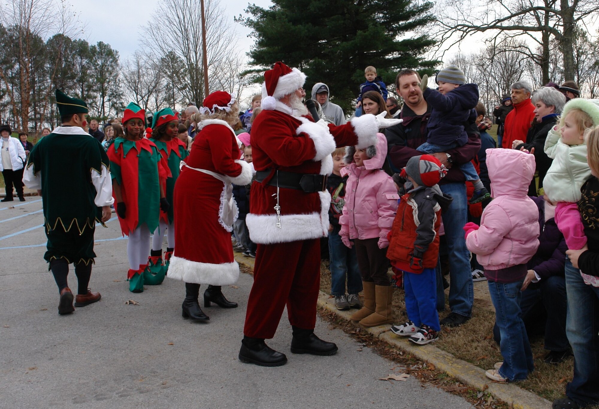 Santa gets a high-five from a little boy who was excited to see him at the Children’s Christmas Party Dec. 6 at the Arnold Lakeside Center at Arnold Air Force Base. (Photo by Andrea Stephens)