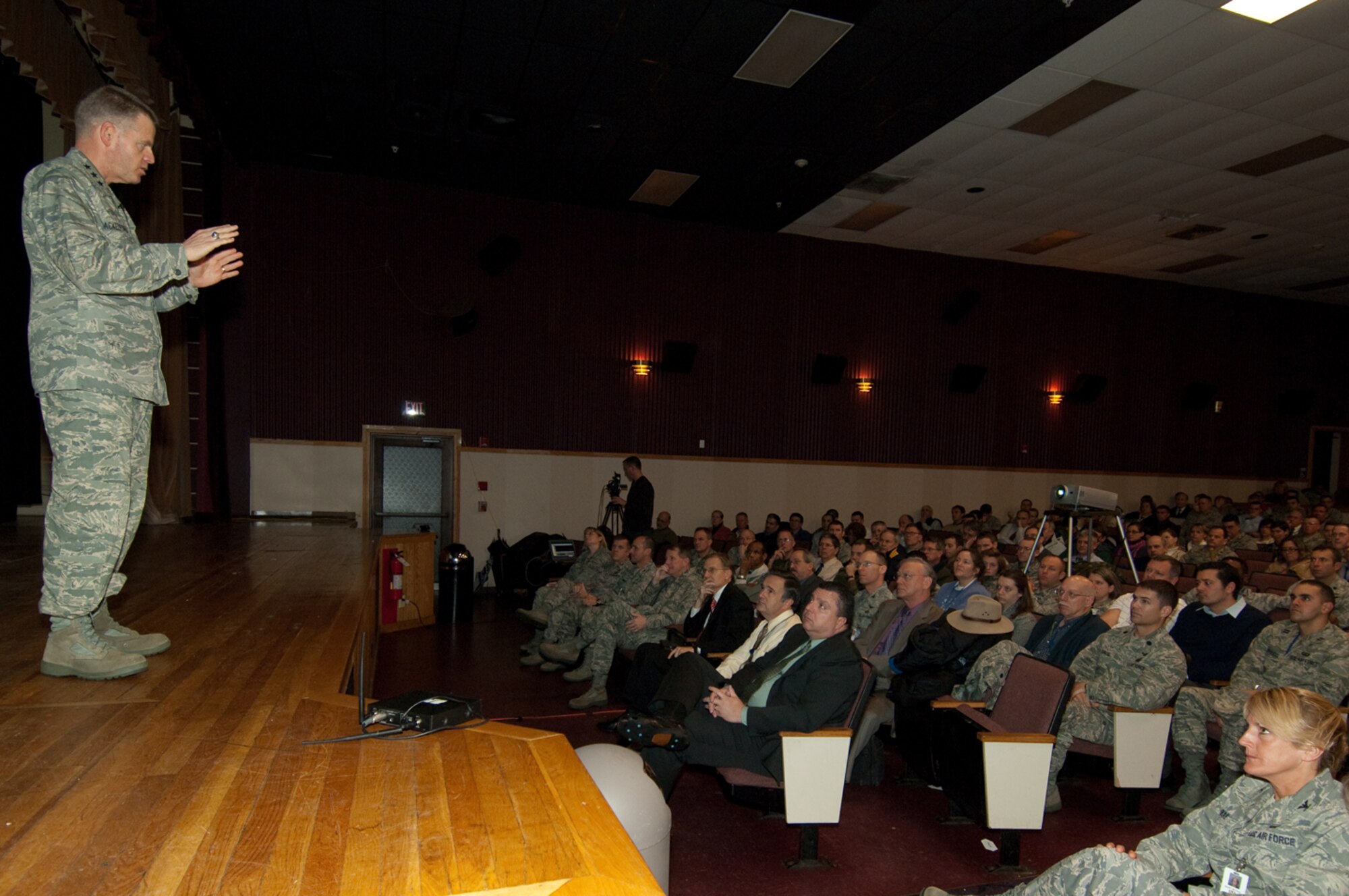 HANSCOM AIR FORCE BASE, Mass. -- Lt. Gen. Mark D. Shackelford, military deputy, Office of the Assistant Secretary of the Air Force for Acquisition, discusses key tenets of the Acquisition Improvement Plan during a ‘Road show’ briefing in the base theater here Dec. 9.  Nearly 600 Electronic Systems Center employees attended the two sessions, in which the general discussed plans to reinvigorate the organic acquisition workforce, contain requirements growth, improve cost estimation, improve source selections and establish clearer lines of acquisition authority and accountability.  (U.S. Air Force photo by Rick Berry)