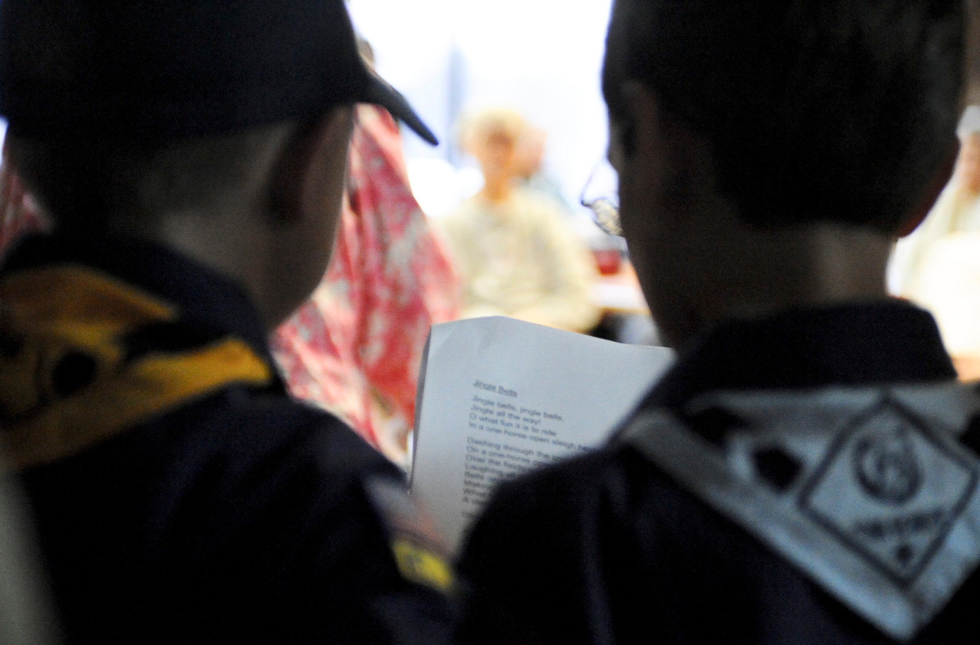 PIONEER VETERANS HOME, Alaska – Members from Cub Scout Pack 110 sing the Christmas carol Jingle Bells to the residents of the Pioneer Veterans Home Dec. 5.  The pack sang Christmas carols as part of a community service project.  (U.S. Air Force photo/Airman 1st Class Christopher Gross)