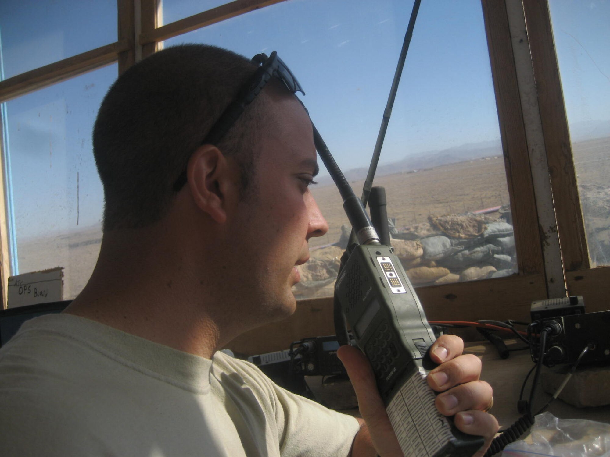 Staff Sgt. Michael Malpedo, an air traffic controller with the 621st Contingency Response Wing at Joint Base McGuire-Dix-Lakehurst, uses a hand-held radio to communicate with aircraft to ensure safe Landing Zone operations while deployed to Shindand AB, Afghanistan.  Air Mobility Command's two CRWs, are highly-specialized in training and rapidly deploying personnel to quickly open airfields and establish, expand, sustain, and coordinate air mobility operations. Additionally, CRWs mentor and advise a host-nation's military on building an interoperable partnership. 

