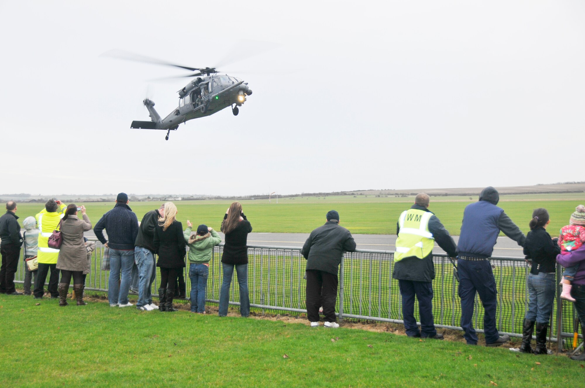 An HH-60G Pave Hawk from Royal Air Force Lakenheath, England, gives Santa Claus a ride to the Imperial War Museum Dec. 5, 2009 at Duxford, England. Volunteers from the 48th Fighter Wing hosted a party at the museum for terminally and seriously ill children. (U.S. Air Force photo/Tech. Sgt. Chris Stagner)
