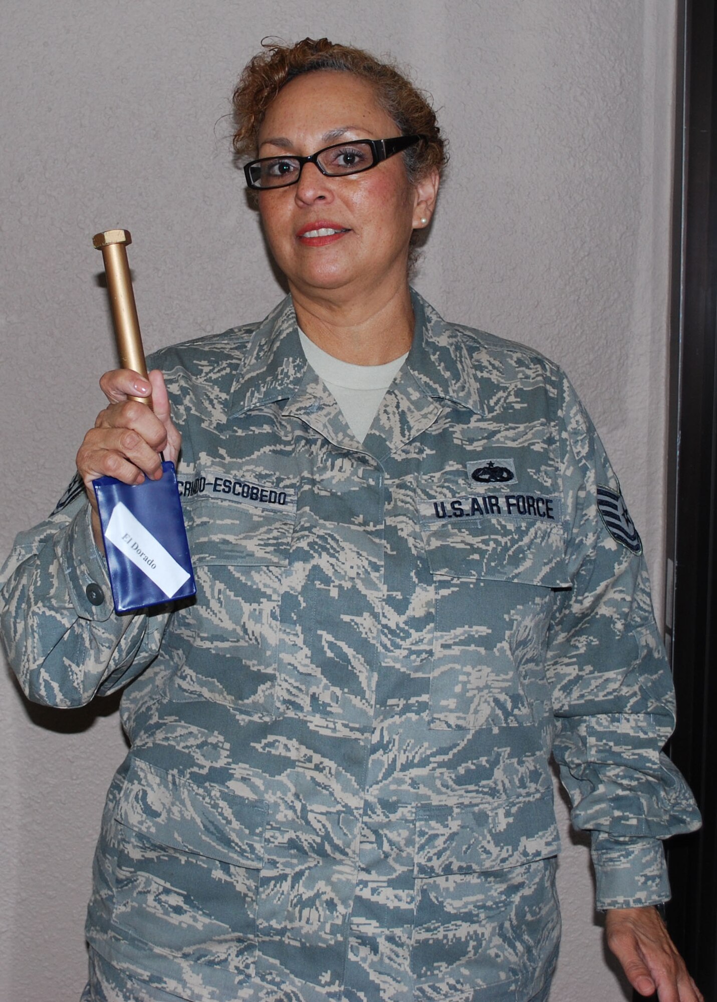 433rd Reservist Tech. Sgt. Diana Criado-Escobedo found the Golden Bolt during the Monday morning Foreign object Damage prevention walk. The walk is held every Monday and the golden bolt is hidden somewhere on the flight line on Mondays after a UTA. The idea behind the golden bolt is to energize volunteers during the weekly FOD prevention walk by adding a little fun to the Monday morning clean-up event. 