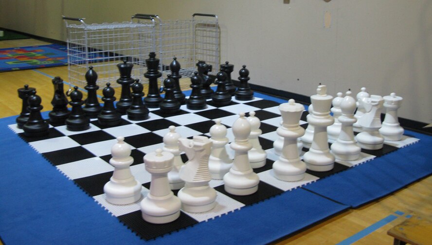 A giant chess game is just one of many play areas featured in the transformed upper gym at the old fitness center, now known as the family fun zone. (U.S. Air Force courtesy photo)