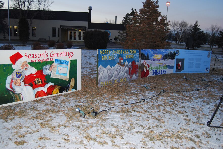 For the annual holiday card contest, entries made by people from the 341st Missile Wing squadrons and organizations were judged at the Christmas tree lighting ceremony at the Grizzly Bend Club Dec. 3. The 341st Logistics Readiness Squadron won first place; the 341st Security Forces Group took second; and the 819th RED HORSE Squadron took third. The entries will remain on display throughout the rest of the holiday season. (U.S. Air Force photo/Airman 1st Class Kristina Overton)