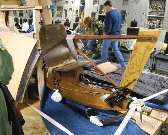 The pilot seat and flight controls from a 1933 German SG 38 glider as it sits in the back of a C-17 bound for the U.S. (U.S. Air Force photo/Chief Master Sgt. William D. Hamilton)