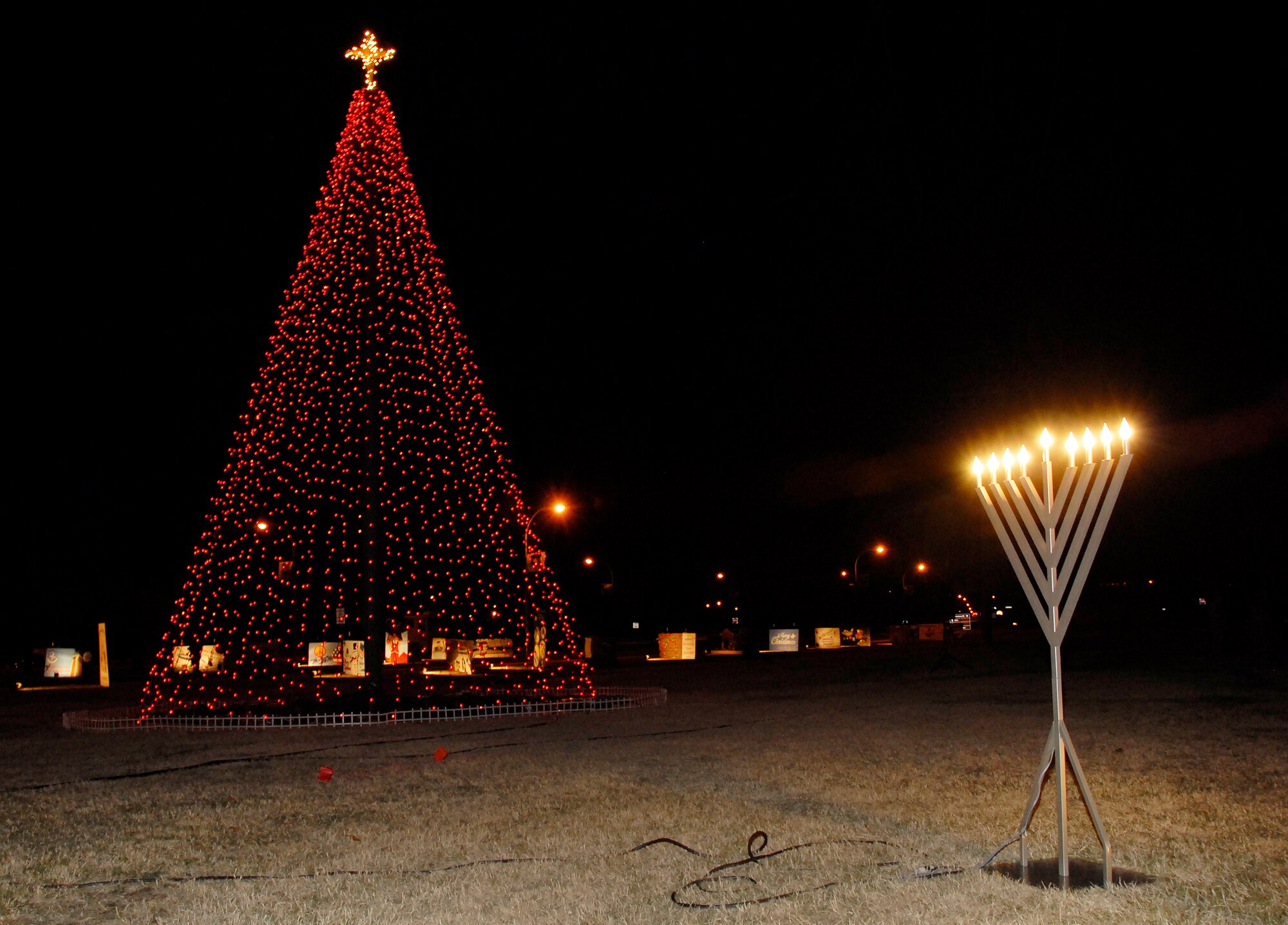 The Sheppard Holiday Tree and the nine candles of the Menorah were lighted Dec. 7 at the corner of Avenue E and 1st Avenue. (U.S. Air Force photo/Harry Tonemah)

