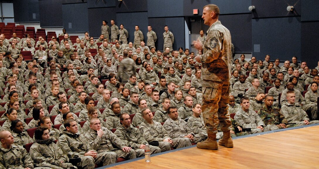 Chief Master Sgt. Charles R. Cole the U.S. Air Force, chief of medical enlisted force speaks to Airmen during his visit Dec. 3 at the base theater. During his meeting with the Airmen he shared stories and answered questions that the Airmen had.(U.S. Air Force photo/ Harry Tonemah) 
