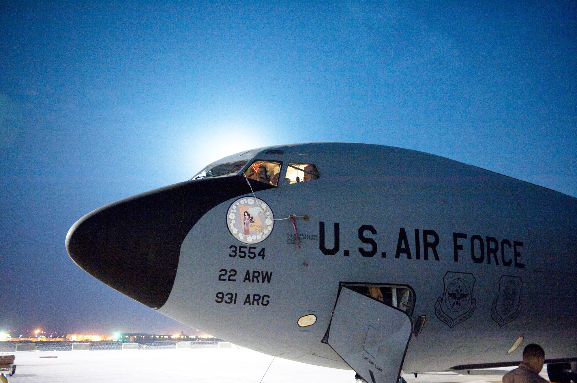 A KC-135 Stratotanker waits on an airfield in Southwest Asia while crew members perfom preflight checks, Dec. 2, 2009. The aircraft is assigned to the Air Force Reserve Command's 22nd Air Refueling Wing at McConnell Air Force Base, Kan. (U.S. Air Force photo/Staff Sgt. Robert Barney)