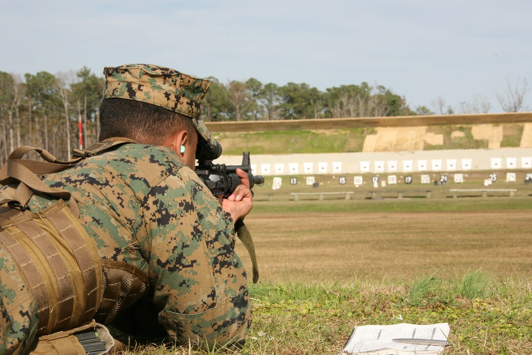 A Cherry Point Marine sends rounds down range during the annual rifle qualification at the air station’s range, Dec. 12. The range reopened for the first time after a 10-month renovation project aimed at correcting possible hazards to air station residents.