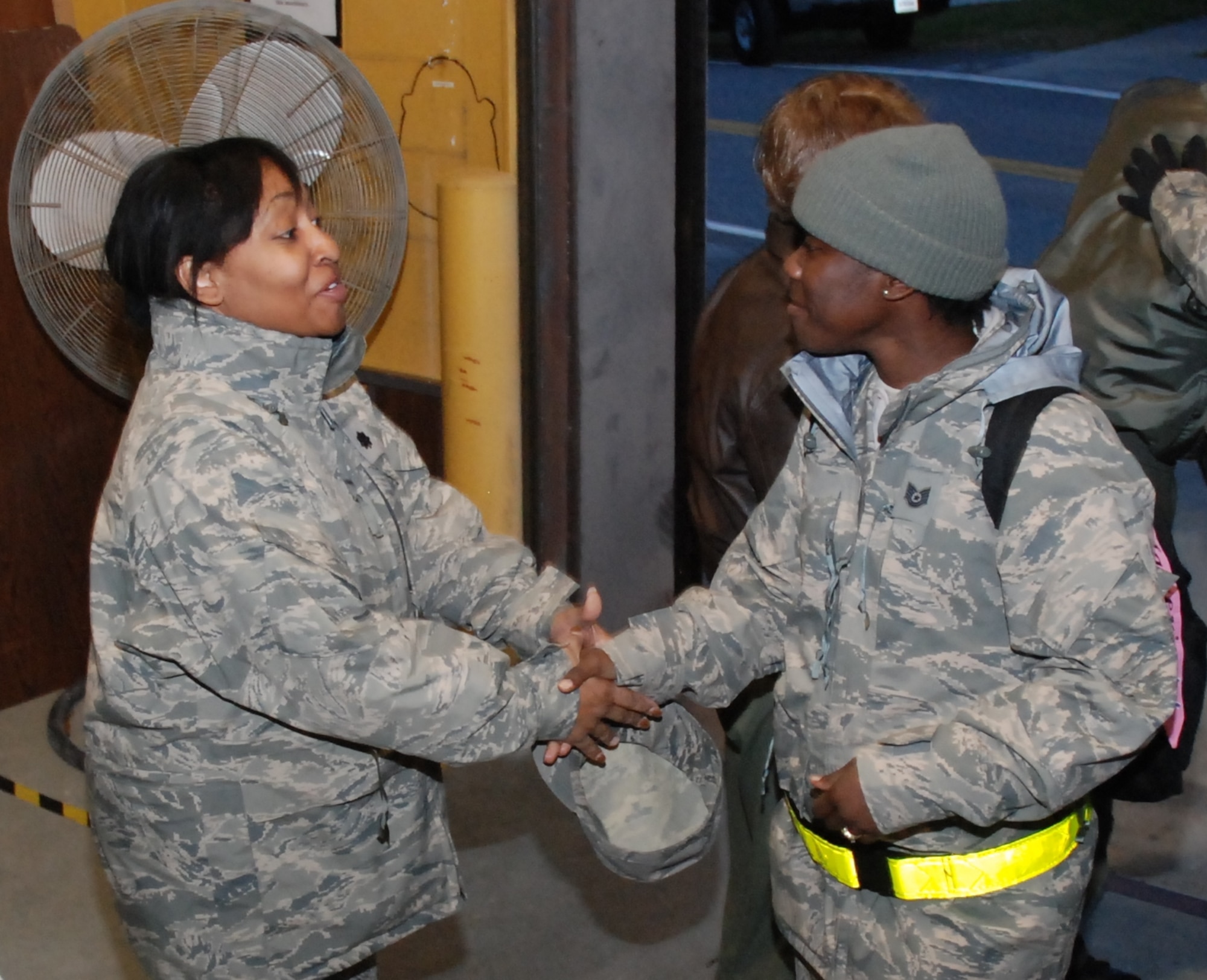 Lt. Col. Donna Gooden, 94th  Mission Support Squadron commander greets an Airman redeploying from the Operational Readiness Inspection held in Gulfport, Miss. Dec. 10.  An ORI tests a unit’s readiness and ability to deploy and perform the wartime mission capabilities. (U.S. Air Force photo/Master Sgt. Stan Coleman)
