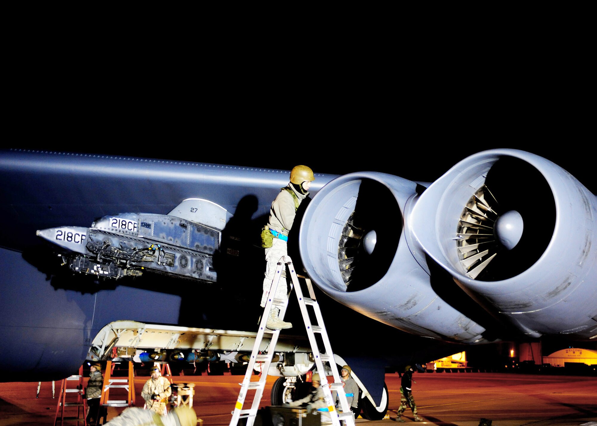 Staff Sgt. Ben Norton works to regenerate a B-52 Stratofortress Dec. 8, 2009, at Barksdale Air Force Base, La.  Airmen work around the clock at a "forward operation" during an operational readiness inspection to determine the ability to rapidly deploy assets and personnel. Sergeant Norton is assigned to the 2nd Aircraft Maintenance Squadron.  (U.S. Air Force photo/Staff Sgt. Sarah E. Stegman)

