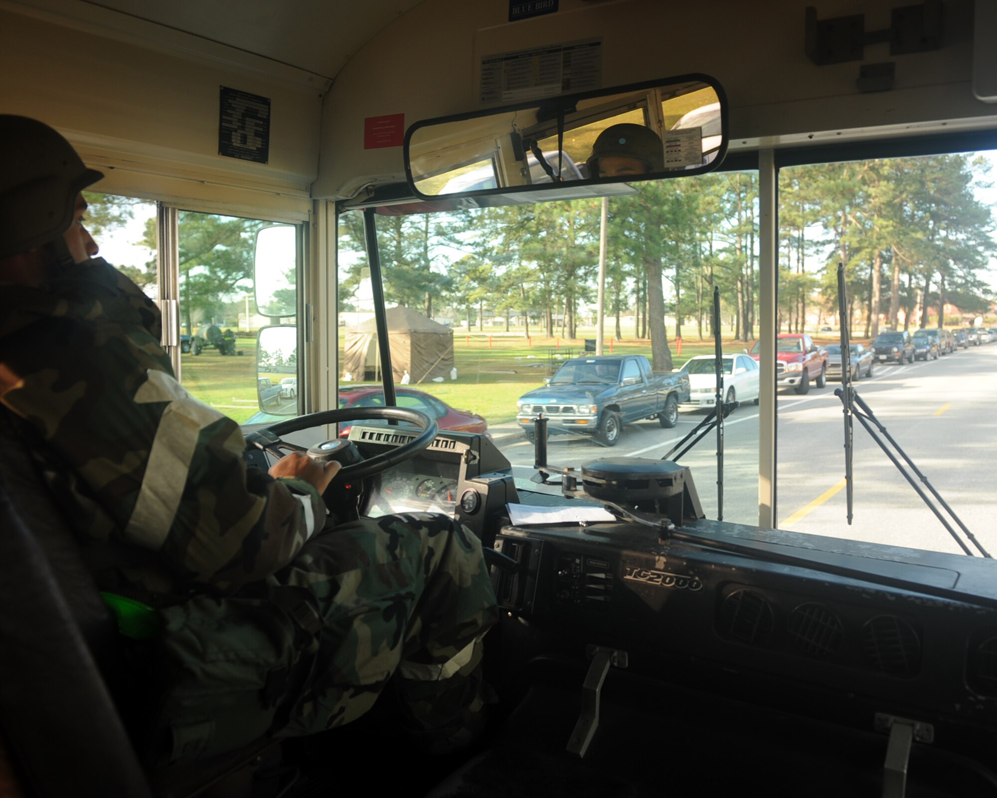 Senior Airman Brian Shumpert, 4th Logistics Readiness Squadron vehicle operator, drives the gold route bus during the operational readiness exercise on Seymour Johnson Air Force Base, N.C., Dec. 10, 2009. There are four bus routes to get Airmen to different areas on base. (U.S. Air Force photo/Senior Airman Ciara Wymbs)