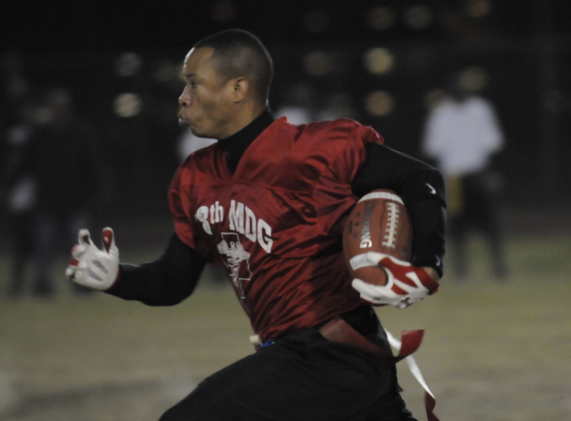 TSgt. Samuel Orr races for a touchdown in last year's intramural championship game. Orr is a running back and receiver on the 78th Medical Group's flag football team, a team that hasn't lost in two seasons.  U. S. Air Force file photo by Sue Sapp