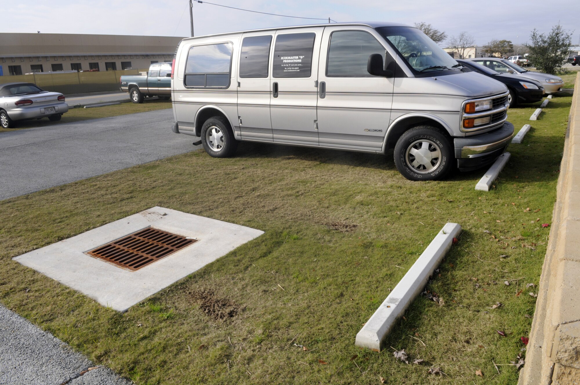 A new 22-vehicle parking lot at Robins incorporates two environmentally friendly concepts intended to reduce water runoff and protect waterways from the toxic drain-off that can come from standard parking lots. U. S. Air Force photo by Sue Sapp