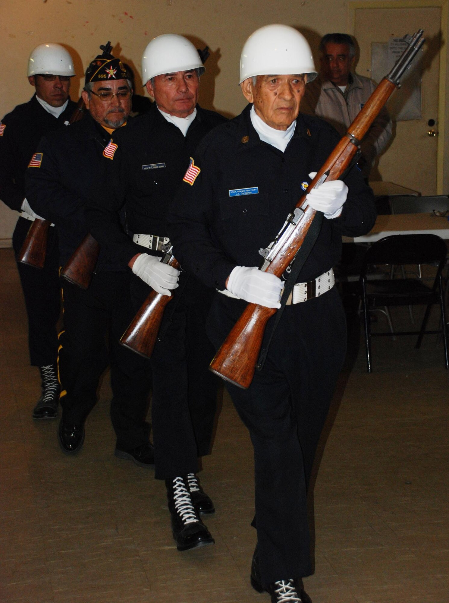 The San Felipe Del Rio Veterans Honor Guard prepares to render a 21-gun salute at the G.I. Forum in Del Rio in honor of the lives lost on the morning of Dec. 7, 1941 in the attack on Pearl Harbor, Hawaii. (U.S. Air Force photo by Airman 1st Class Blake Mize)