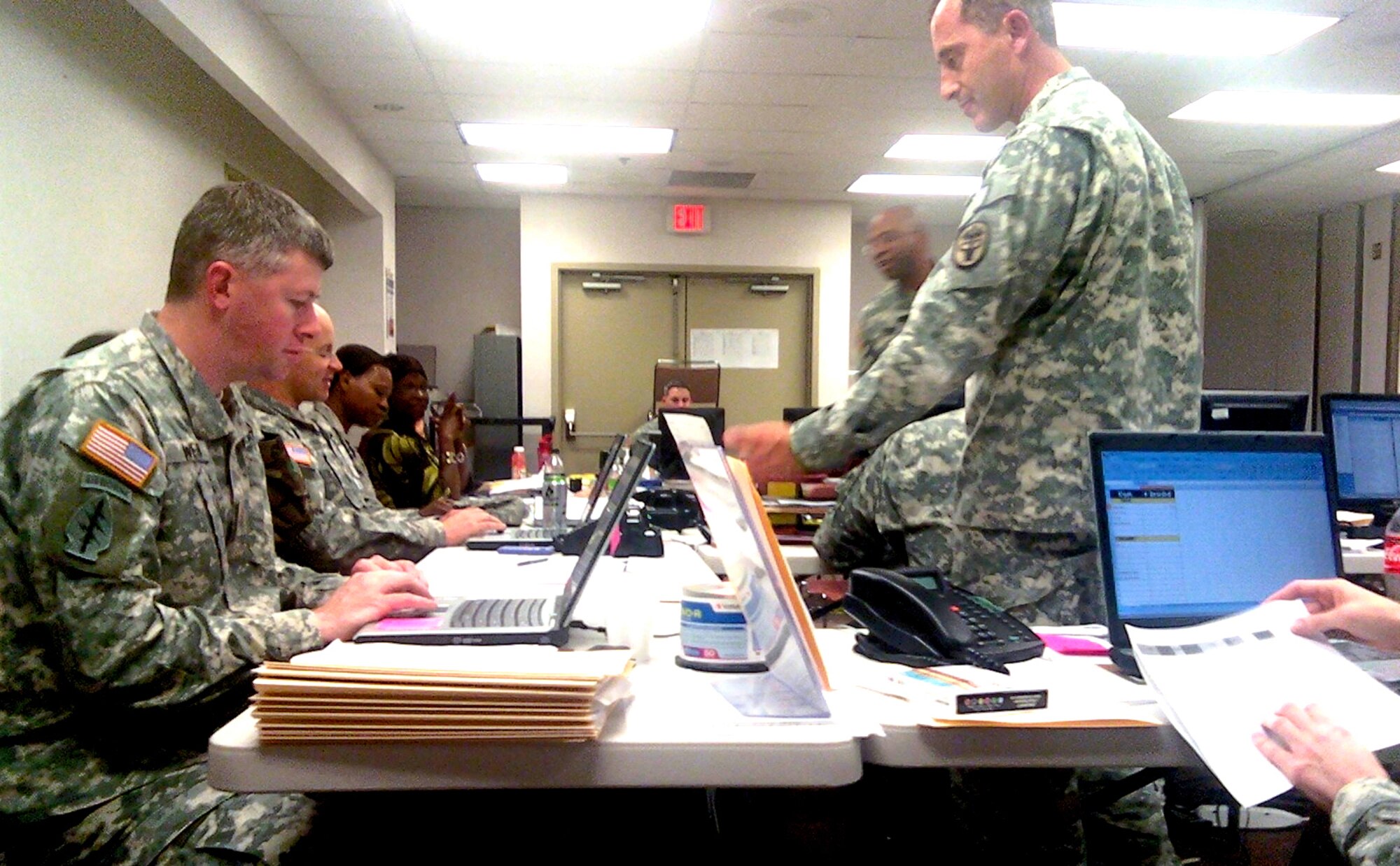 Army and Air Force traumatic stress response teams work around the clock at the  Behavioral Health Emergency Operations Center, Ft. Hood, Texas.  The Air Force TSR team helped conduct more than 2,100 traumatic stress debriefings for hospital staff Nov. 8 to Dec. 2, 2009, at the Carl R. Darnall Army Medical Center. (courtesy photo)

