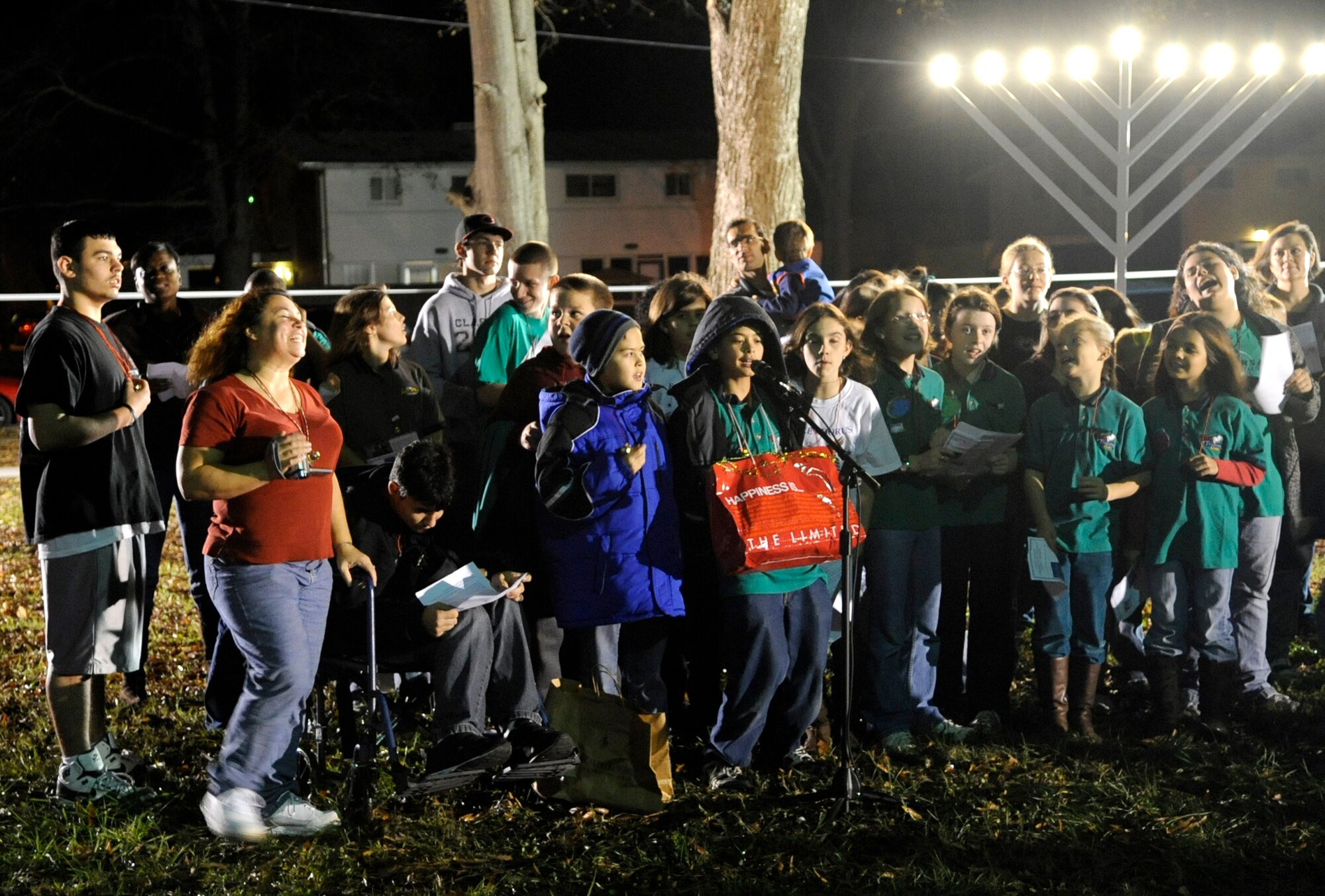 LANGLEY AIR FORCE BASE, Va. — The Bethel Manor Chapel combined children’s choir sings holiday songs during the annual tree-lighting ceremony Dec. 9 at the Bethel Manor Chapel.  The tree was purchased by Team Langley members from Maine, and this year, the event coincides with the Year of the Air Force Family. (U.S. Air Force photo/ Senior Airman Dana Hill)