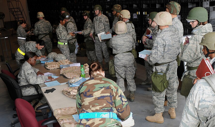 MOODY AIR FORCE BASE, Ga. -- Members from Moody process through a mobility bag issue line during a Phase I Operational Readiness Exercise here Dec. 8. Moody is preparing for an upcoming Phase I Operational Readiness Inspection scheduled to be in March 2010. (U.S. Air Force photo by Airman 1st Class Joshua Green)
