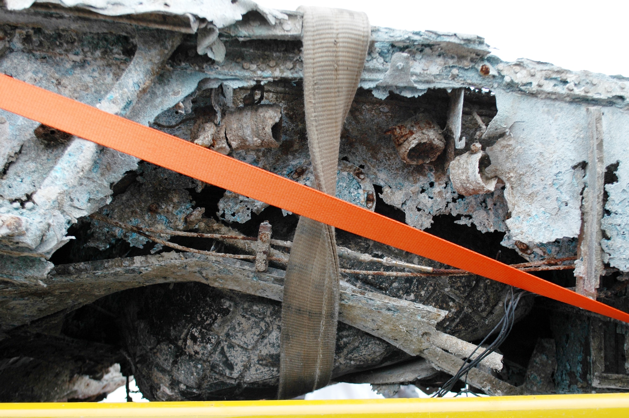 Wreckage believed to be that of a P-47 Thunderbolt was recovered from the bottom of the Adriatic Sea May 12, 2009, by an Italian fishing boat crew. An Italian aero club signed for the wreckage during a Nov. 14, 2009, ceremony in Chioggia, Italy, and hope to recover a serial number from the landging gear during their restoration project expected to take two years. The serial number is a key to Air Force historians so they can trace the aircraft to a specific unit and in identifying who was piloting the aircraft the day it crashed. (U.S. Air Force photo/Tech. Sgt. Michael O'Connor)