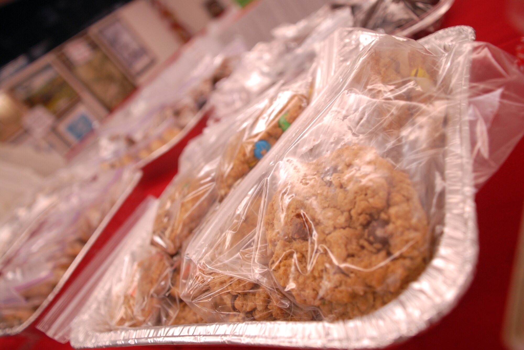 HICKAM AIR FORCE BASE, Hawaii - Bags of cookies await to be bagged during the annual Cookie Caper here, Dec. 10. Every year airmen living in the dorms recieve a bag of homemade cookies put together by volunteers. More than 398 airmen will recieve a bag of goodies this year. (U.S. Air Force photo/Senior Airman Gustavo Gonzalez)