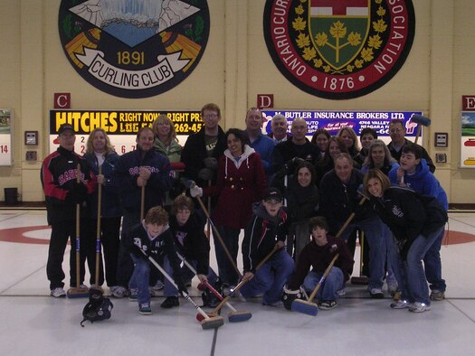 Members of the 914th Airlift Wing leadership try their hand at curling, November 27, 2009, Niagara Falls Ontario, Canada.  The 914th leadership spent the day after Thanksgiving curling at the Niagara Falls Curling Club. The Niagara Falls Curling Club, Niagara Falls Ontario is the closest curling club to the New York State border. (U.S. Air Force photo by Lt. Col. Larry R. Kroecker)          
