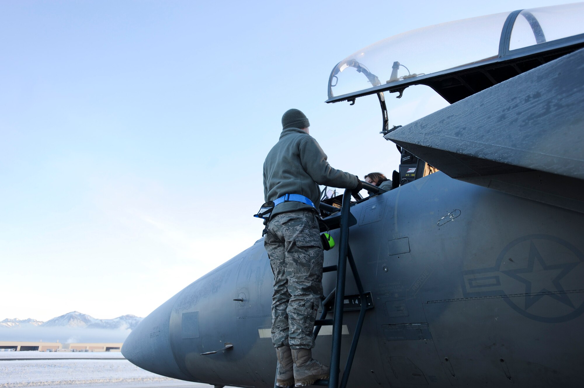 ELMENDORF AIR FORCE BASE, Alaska – Two 19th Aircraft Maintenance Unit, maintainers work on one of Elmendorf’s F-15 Eagles Dec. 7. The arctic maintainers can work in temperatures as low as 40 below zero.  (U.S. Air Force photo/Airman 1st Class Christopher Gross)