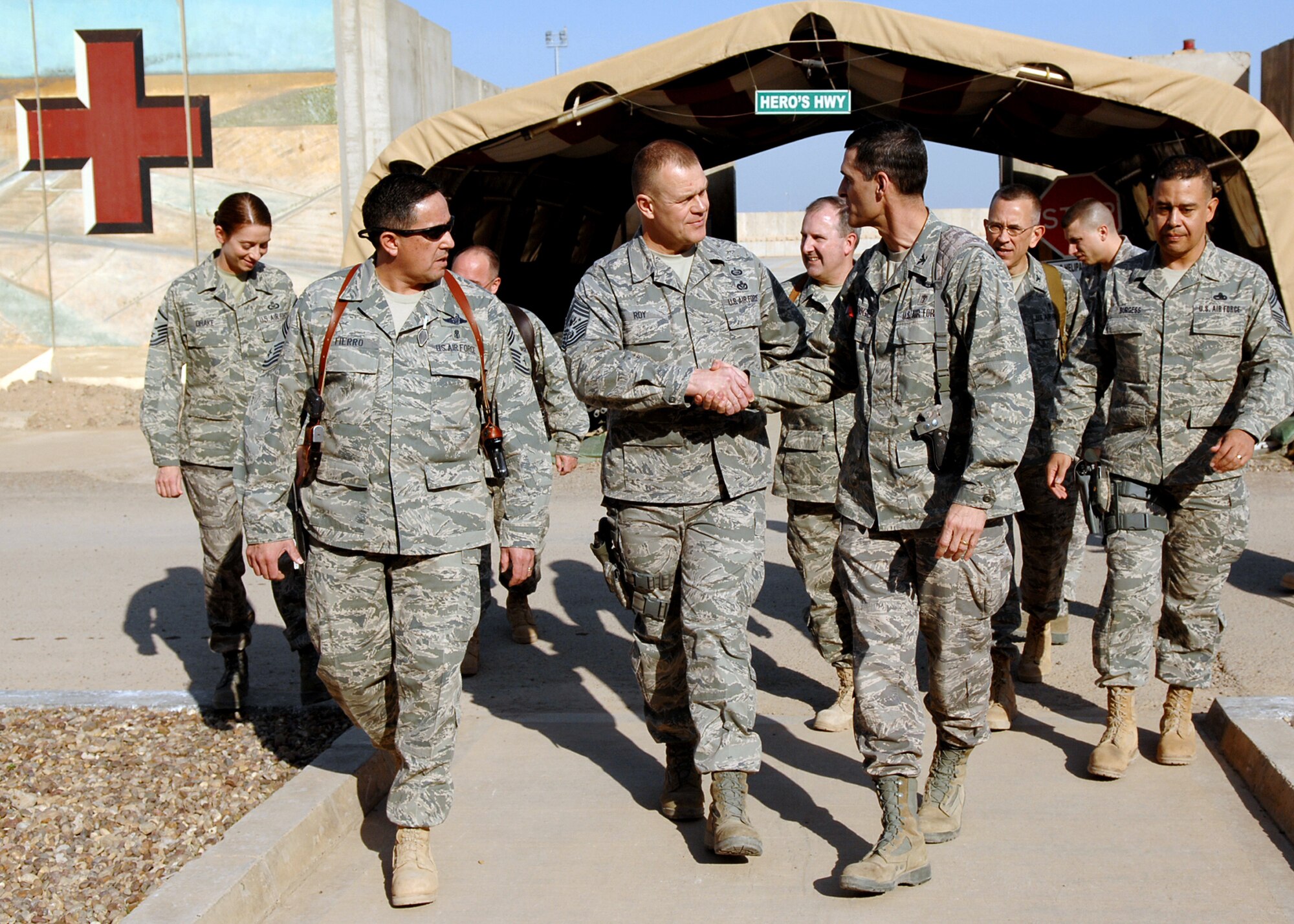 Chief Master Sgt. of the Air Force James A. Roy shakes hands with Col. Mark Koeniger after touring Hero's Highway at the Air Force Theater Hospital Dec. 4, 2009, at Joint Base Balad, Iraq. During his first visit to JB Balad as the chief master sergeant of the Air Force, Chief Roy toured various locations on the base and mentored Airmen during an Airman's call. Colonel Koeniger is the commander of the 332nd Expeditionary Medical Support Group, (U.S. Air Force photo/Senior Airman Christopher Hubenthal)