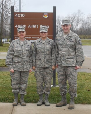 WRIGHT-PATTERSON AIR FORCE BASE, Ohio - Thanks to the Recruiter Assistance Program, Airman First Class Katie Gonzales was able to spend some quality time with her parents, Master Sgt. Craig Hunt, 445th Maintenance Group, quality assurance, and Master Sgt. Judy Hunt, 445th Mission Support Flight, chief of personnel readiness, before heading overseas to her first assignment; Royal Air Force Mildenhall, United Kingdom. RAP is an active-duty leave program run by Air Force Recruiting Service. The Air Force grants up to 12 days of non-chargeable leave, including one weekend, in accordance with Air Force Instruction 36-3003 Military Leave Program.  (U.S. Air Force photo/Stacy Vaughn)